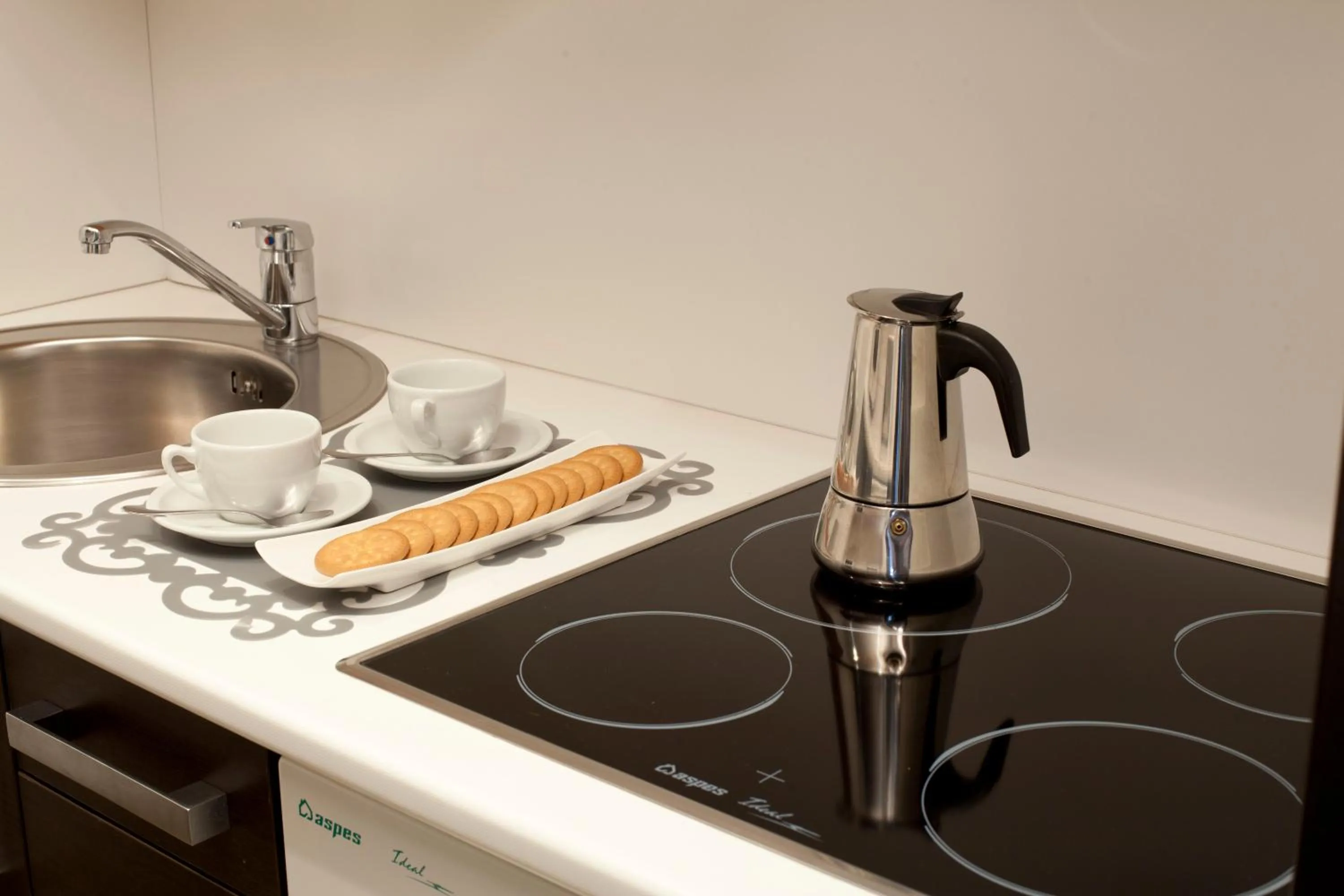 Kitchen or kitchenette in Aparthotel Attica21 As Galeras