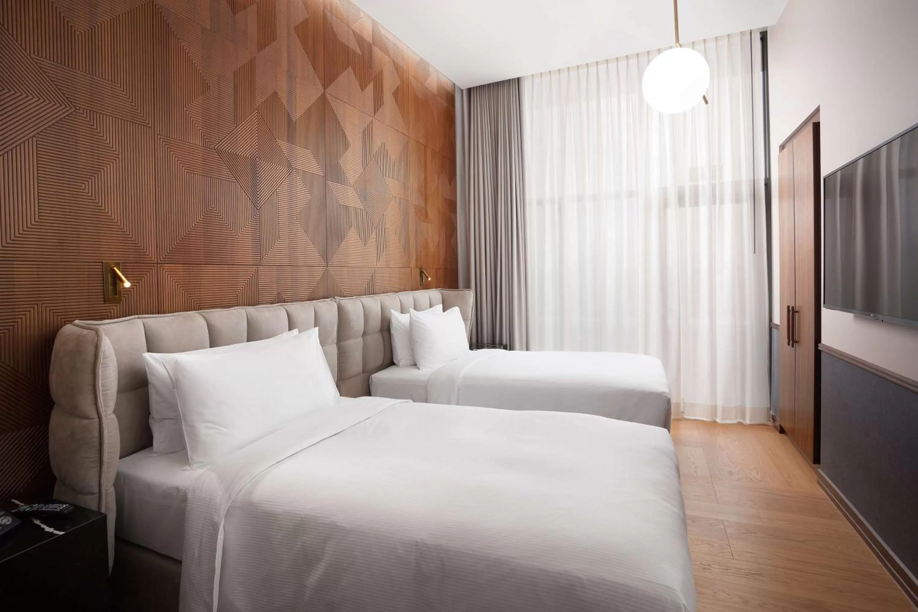 Bed in Iceland Parliament Hotel, Curio Collection By Hilton