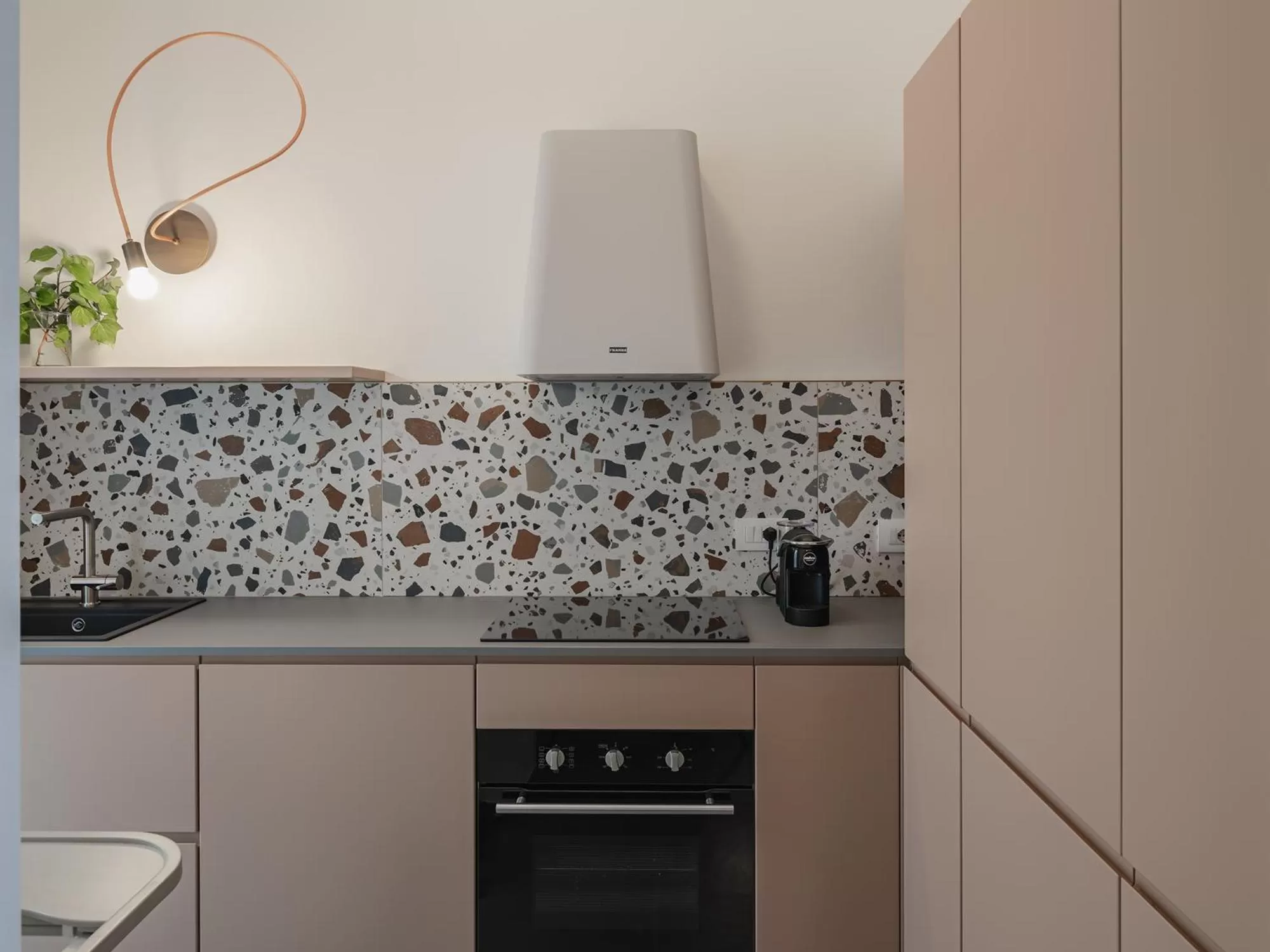 Kitchen or kitchenette in Living u HomeSuites