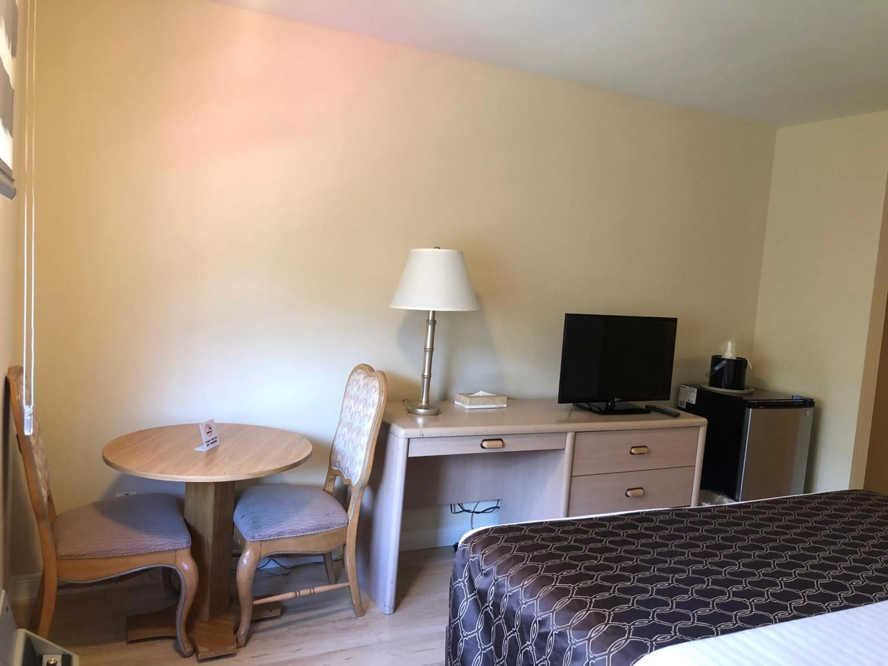 Bed in Rotex Western Inn