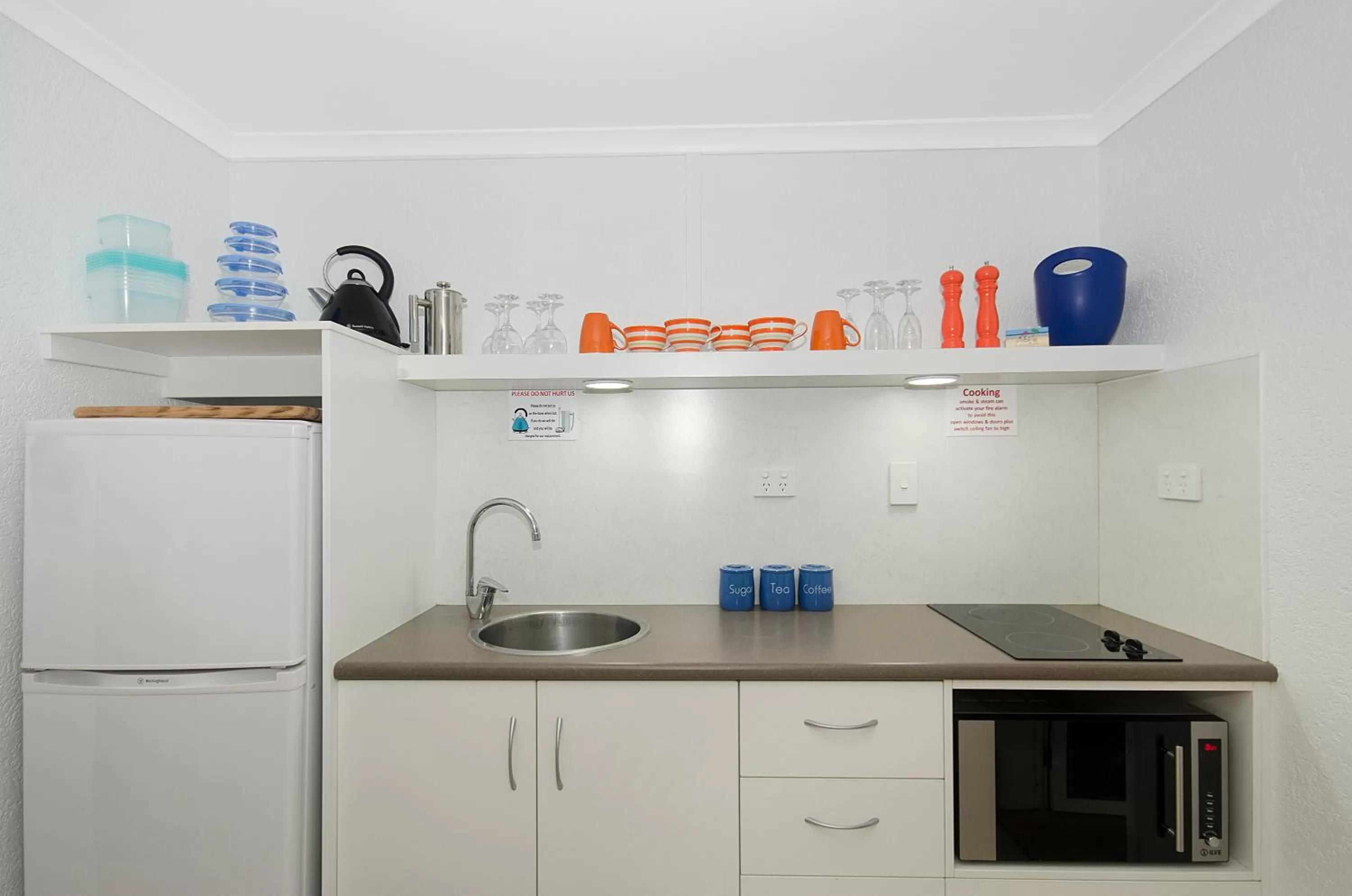 Kitchen or kitchenette in By The Sea Port Douglas