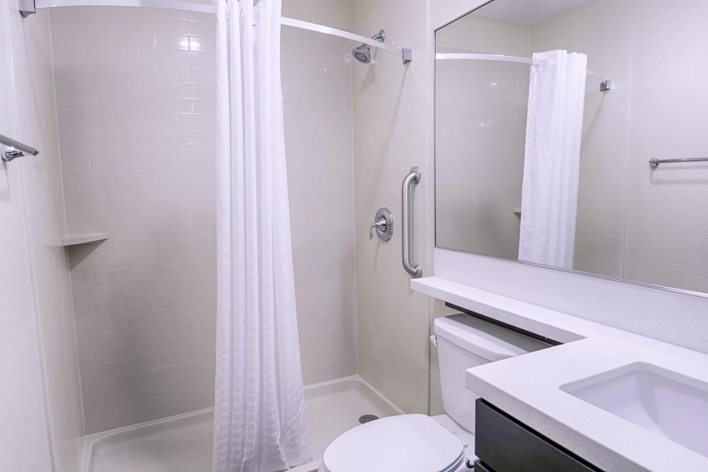 Bathroom in Candlewood Suites Lakeville I-35 by IHG
