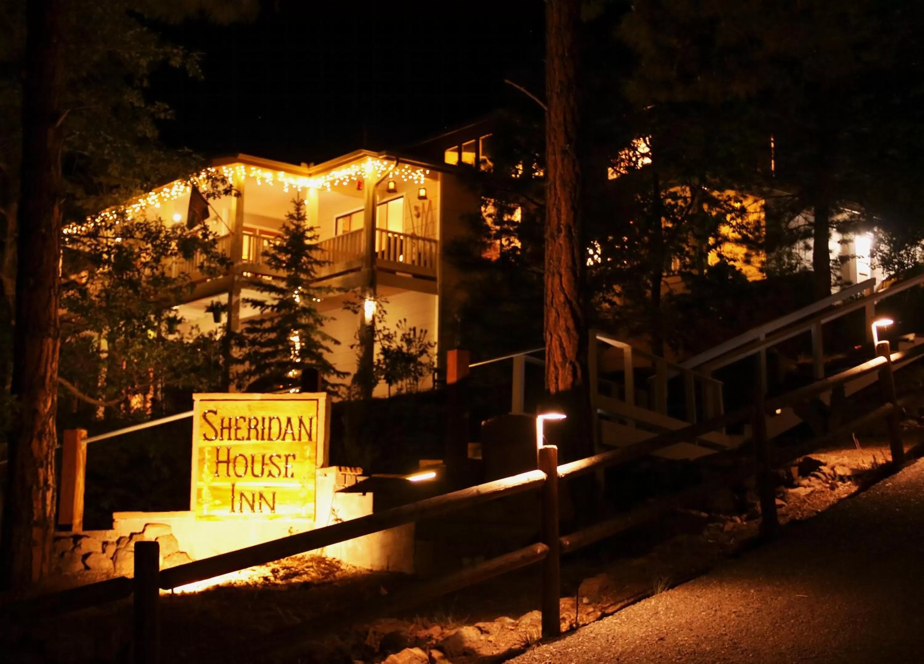 Property logo or sign in Sheridan House Inn- Adult Only Accommodation