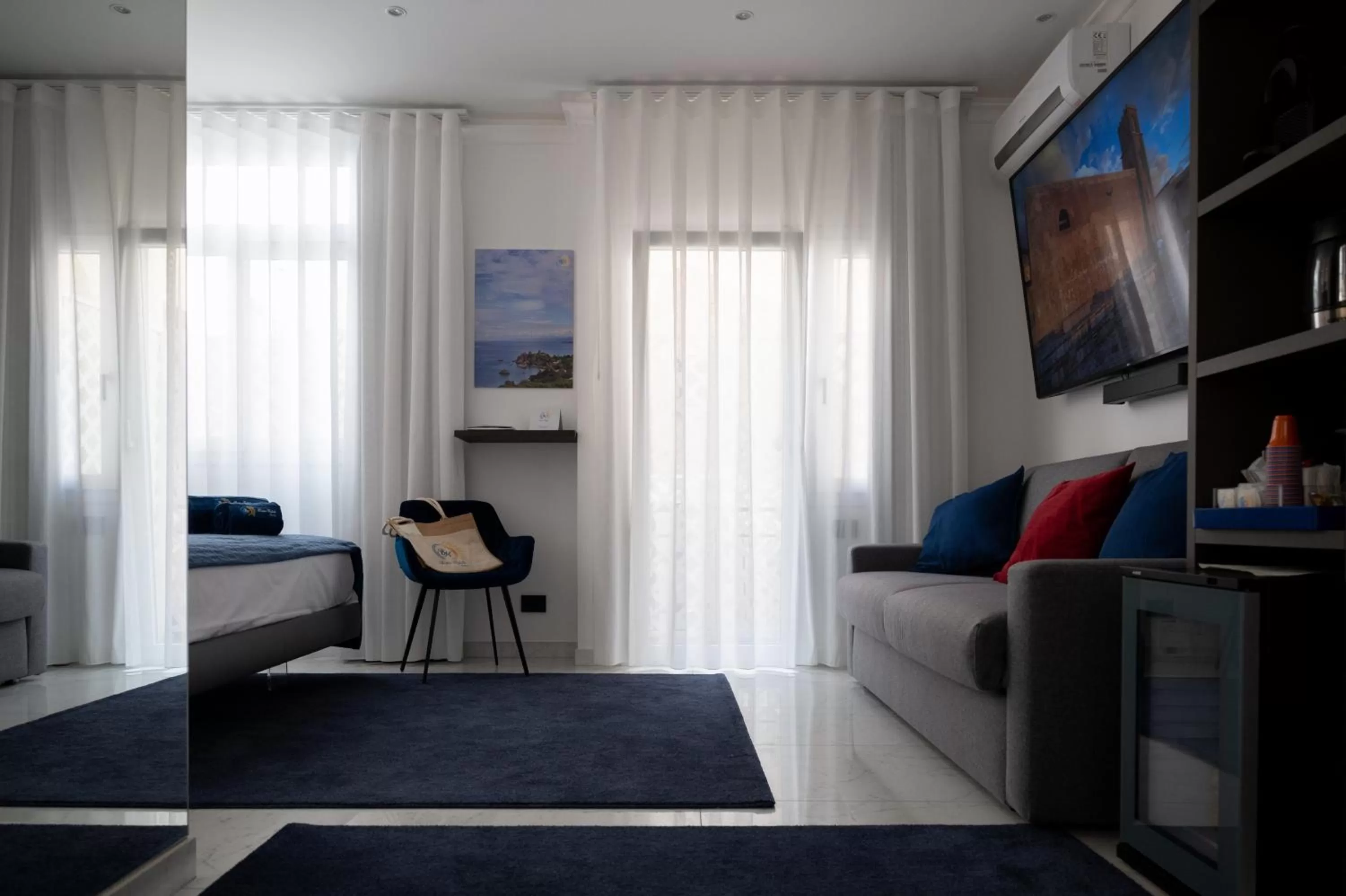 Photo of the whole room in BM SUITES CEFALU