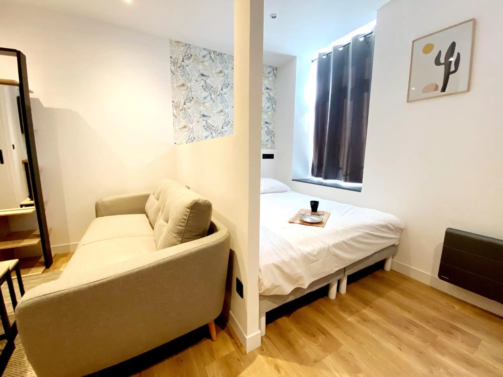 Bed in Le Bras d'or Apparts et Spa