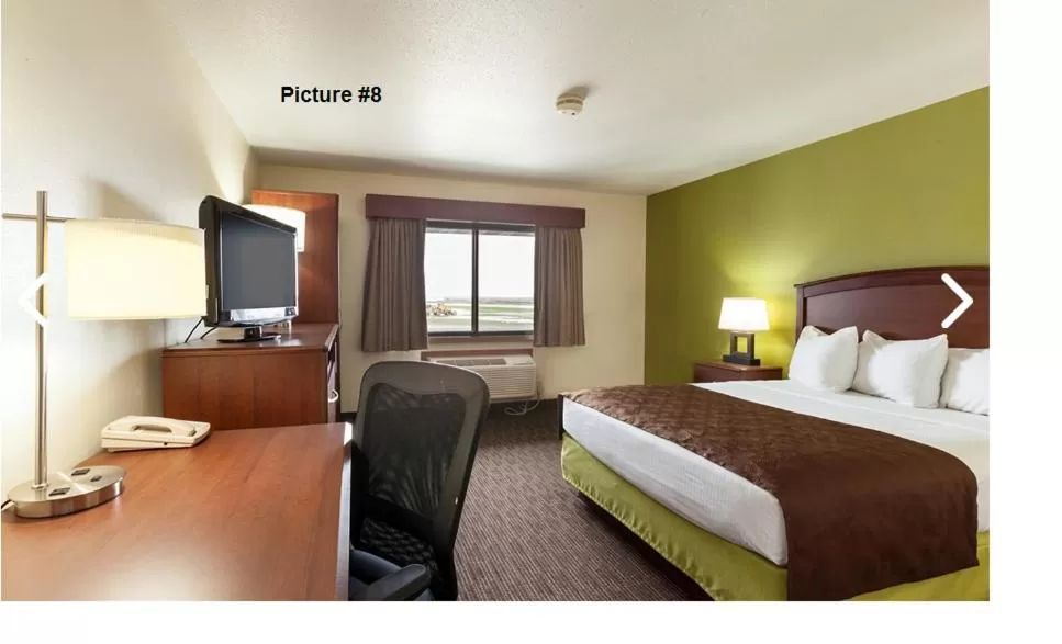 Bed in AmericInn by Wyndham Wahpeton