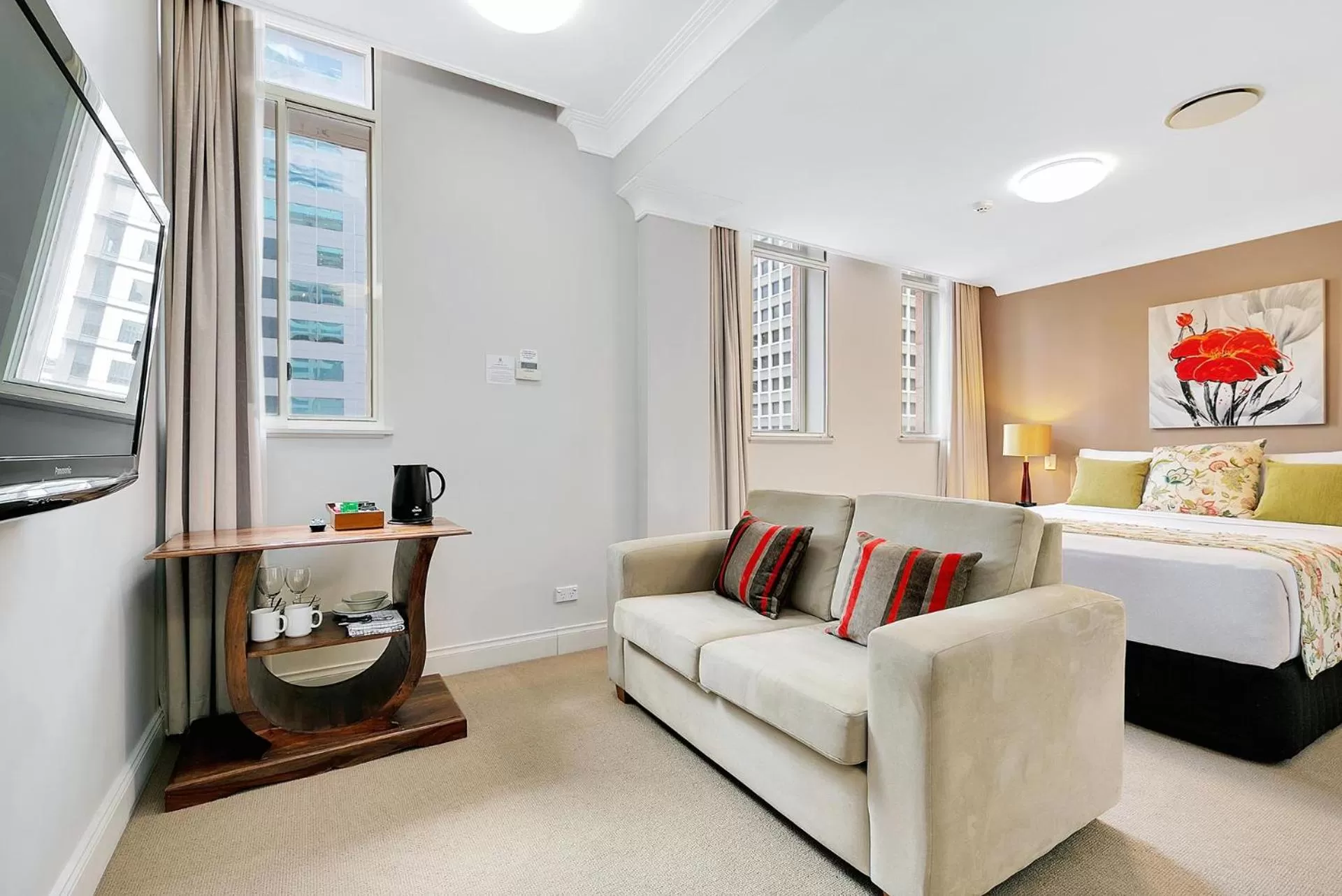 Bed in Manor Apartment Hotel