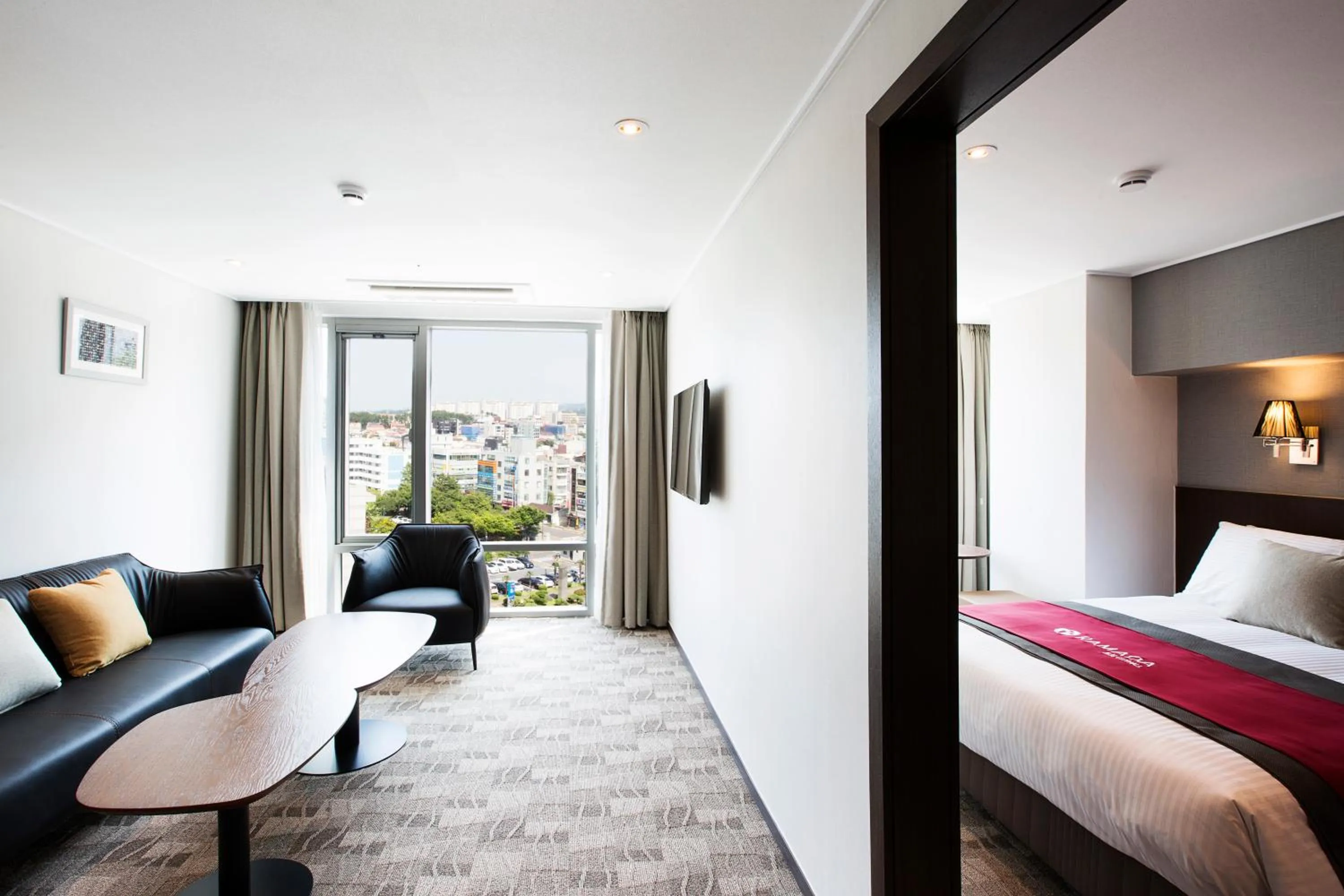 Bed in Ramada by Wyndham Jeju City Hall