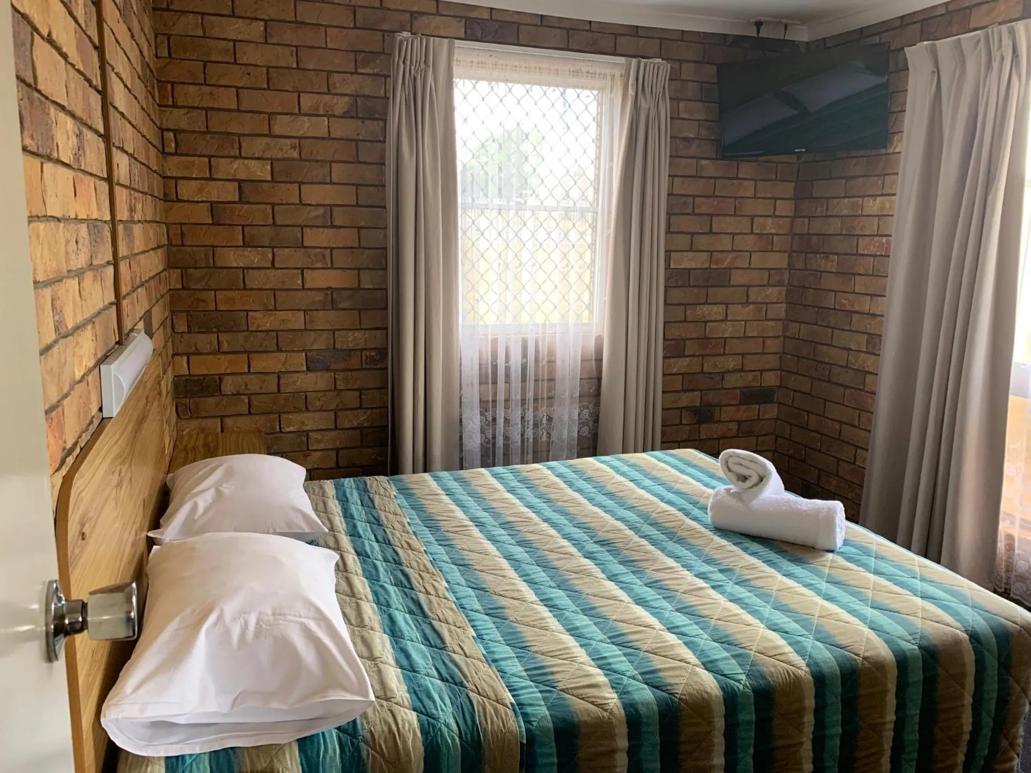 Bed in Bridge Street Motor Inn