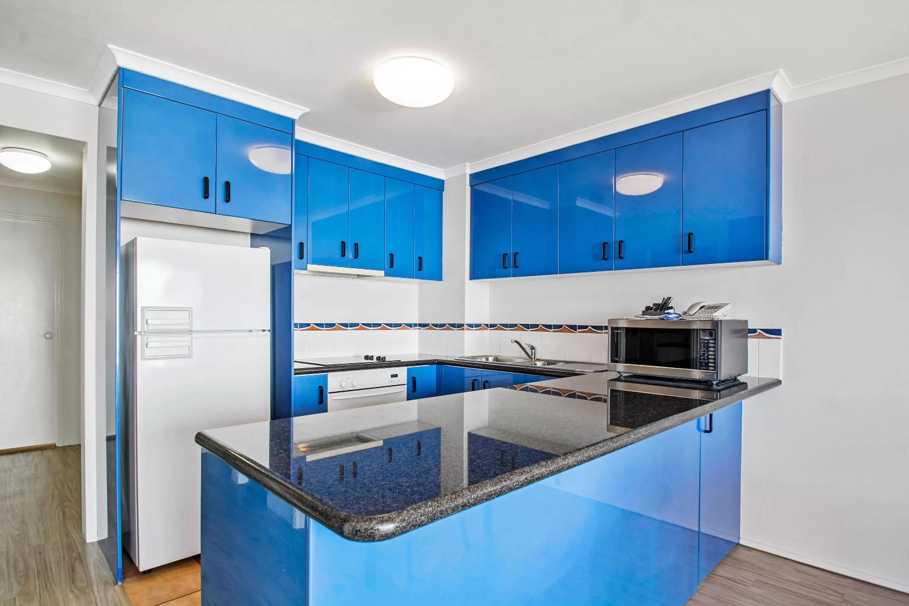 Kitchen or kitchenette in BreakFree Great Sandy Straits