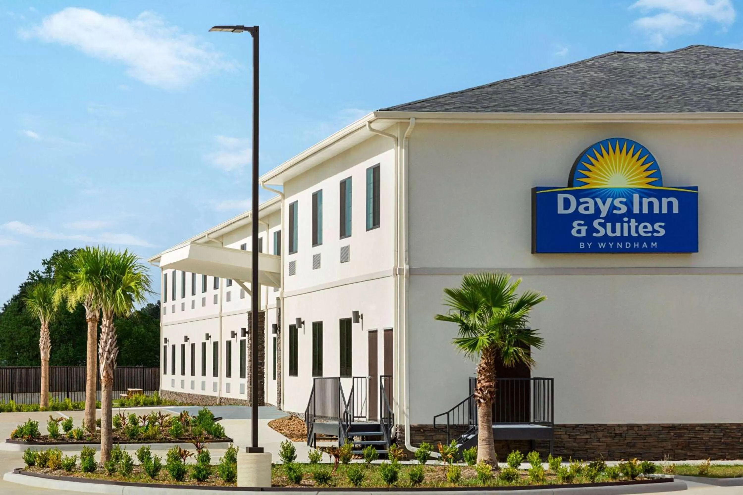 Property building in Days Inn & Suites by Wyndham Greater Tomball