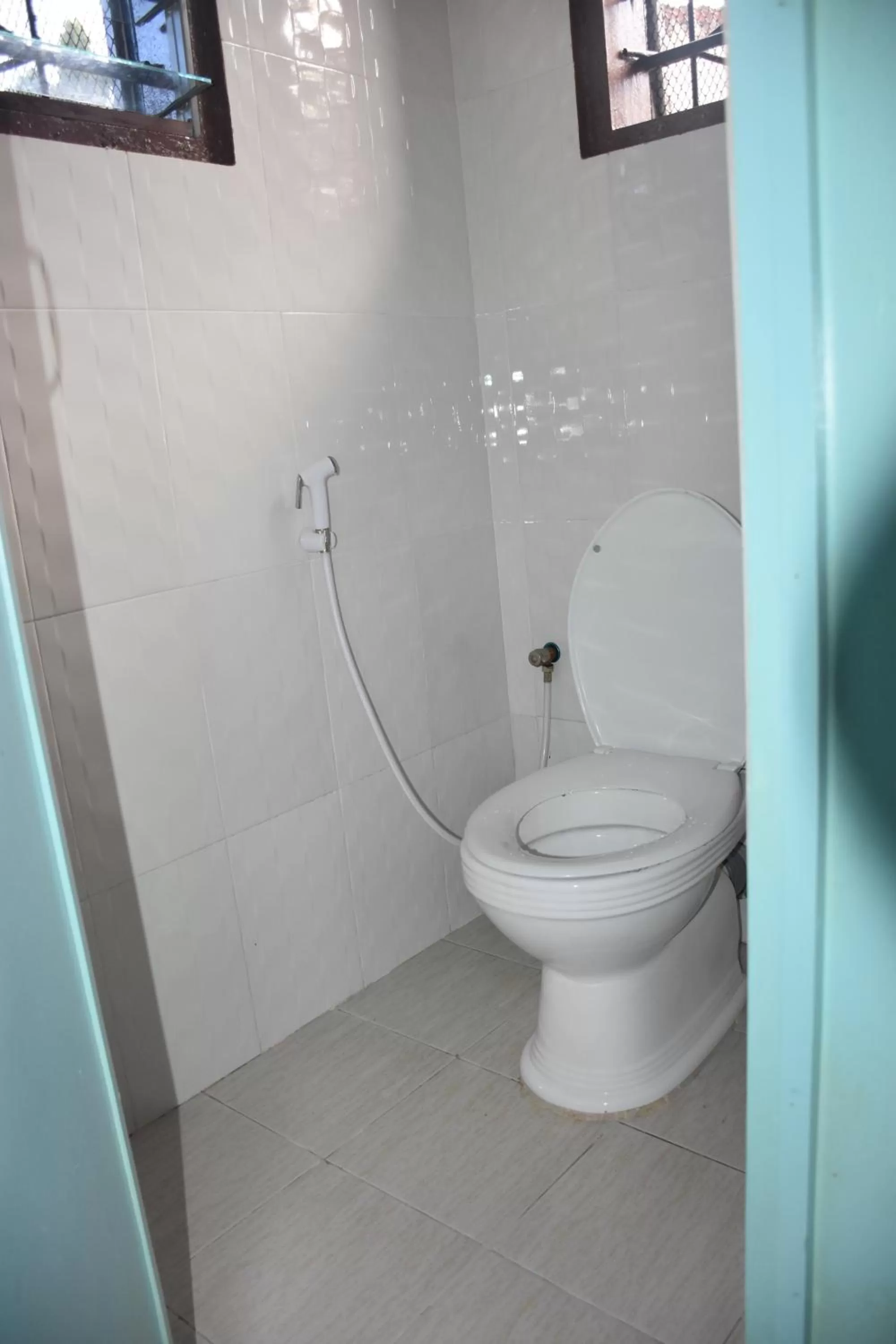 Toilet, Bathroom in L&J Modern Backpackers Kinondoni