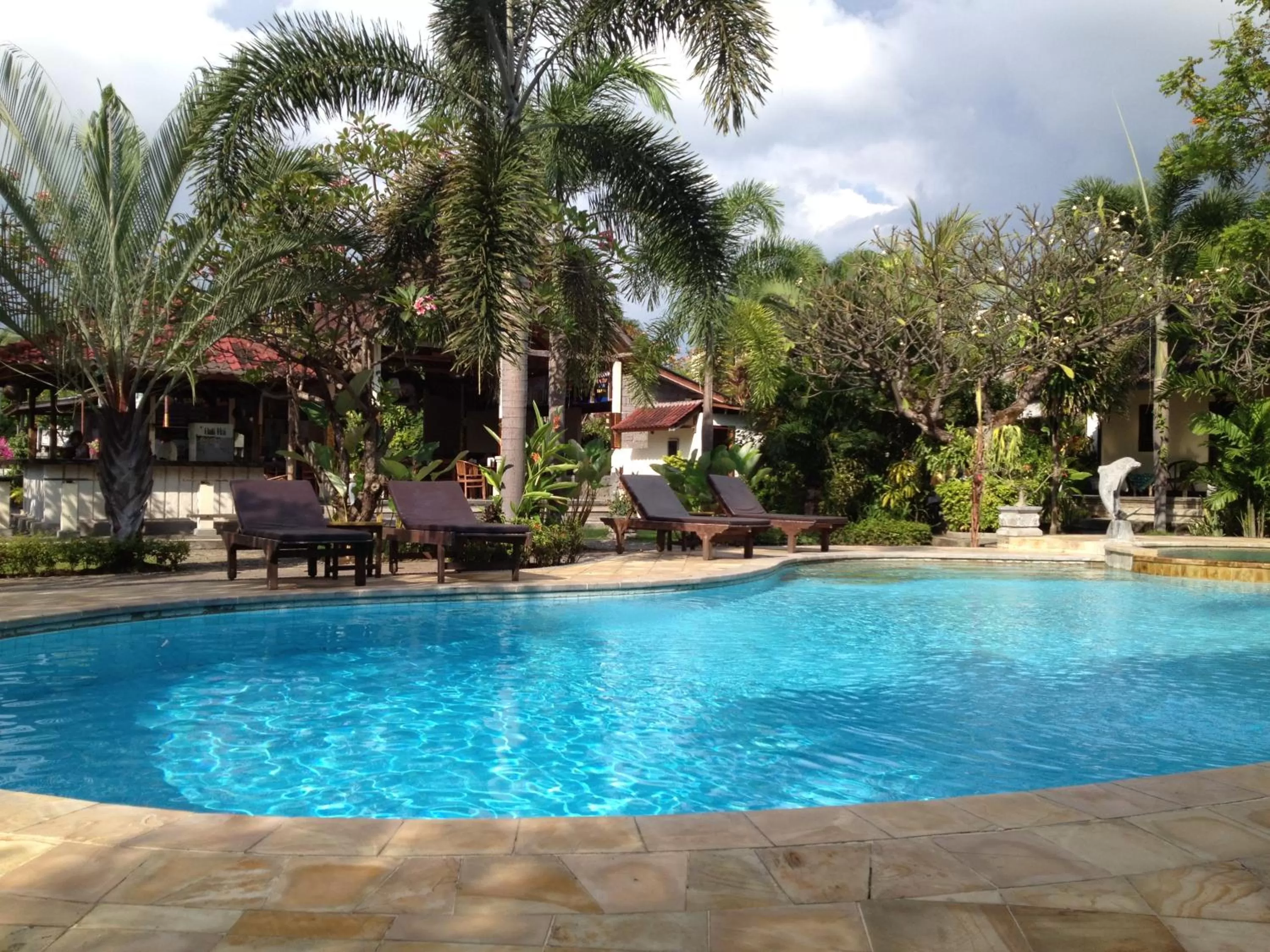 Swimming pool, Property Building in Astina Hotel