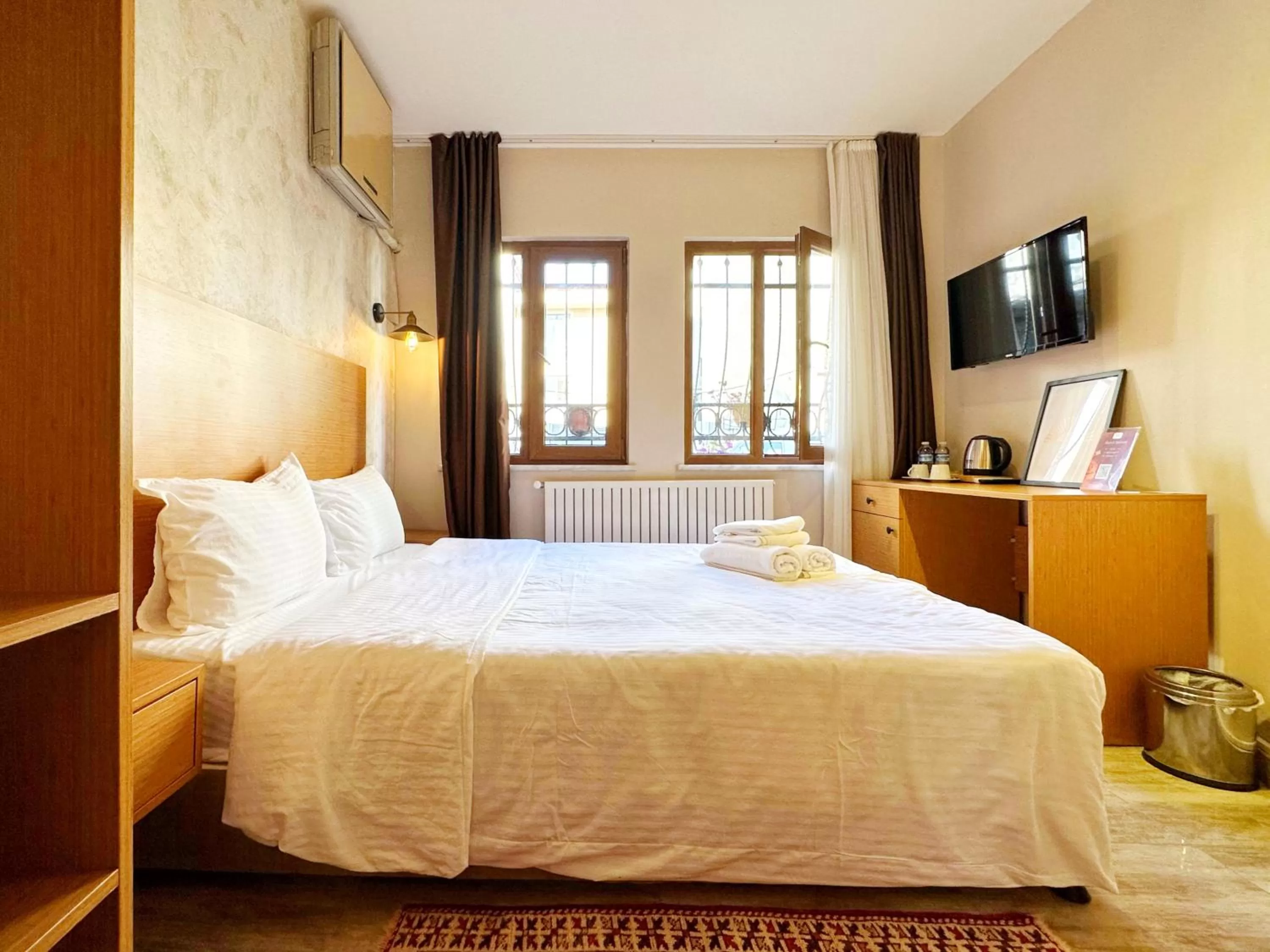 Bed in Sultan Pier Hotel