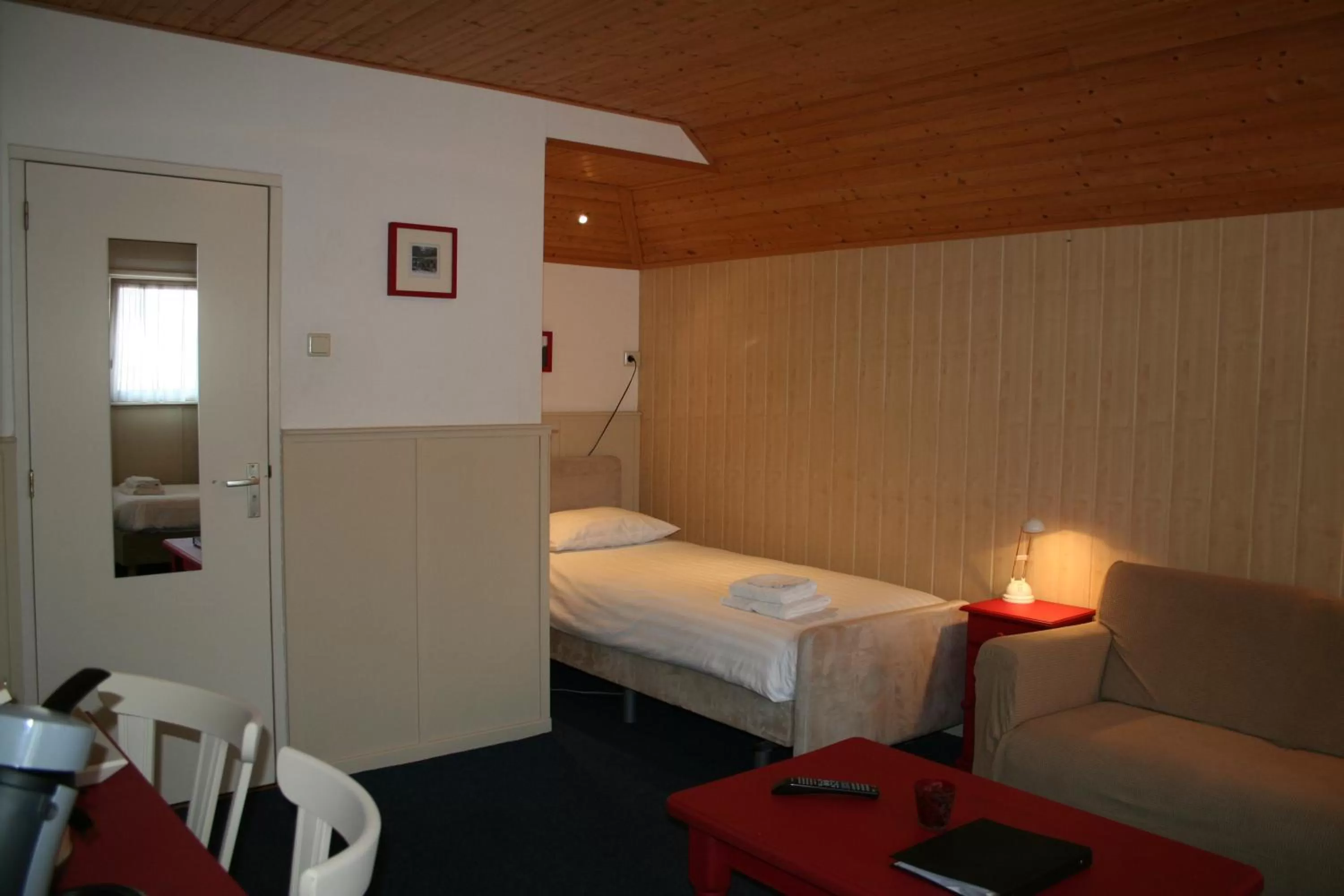 Bed in Hotel Verhoeven