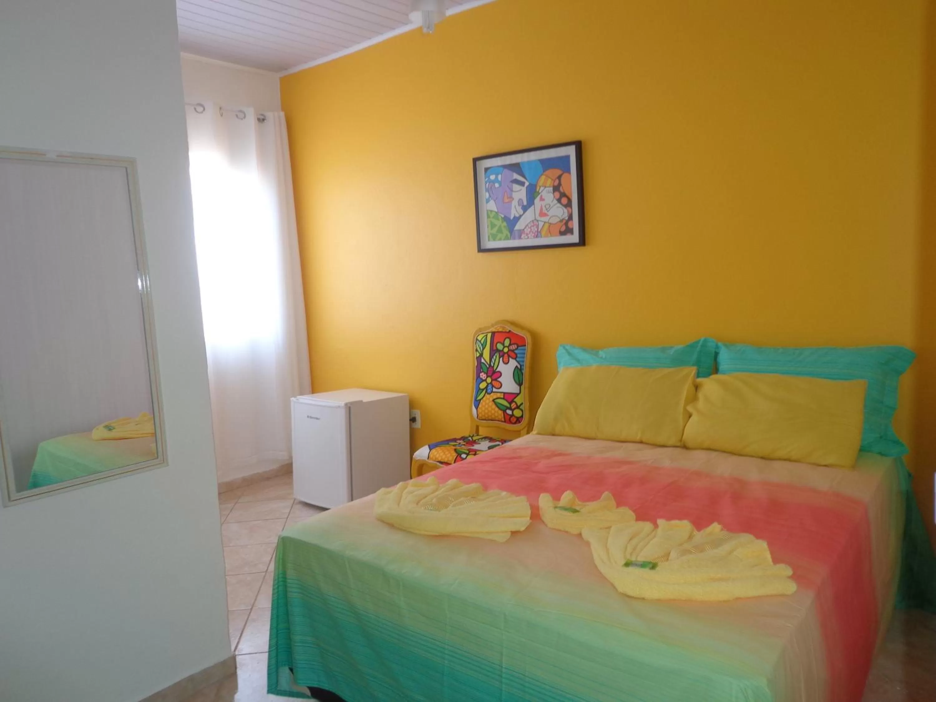 Photo of the whole room, Bed in Pousada da Rose Paraty