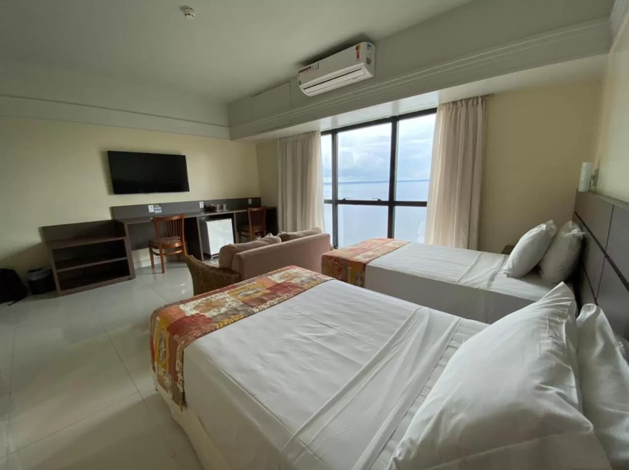 Photo of the whole room, Bed in Tropical Executive Hotel