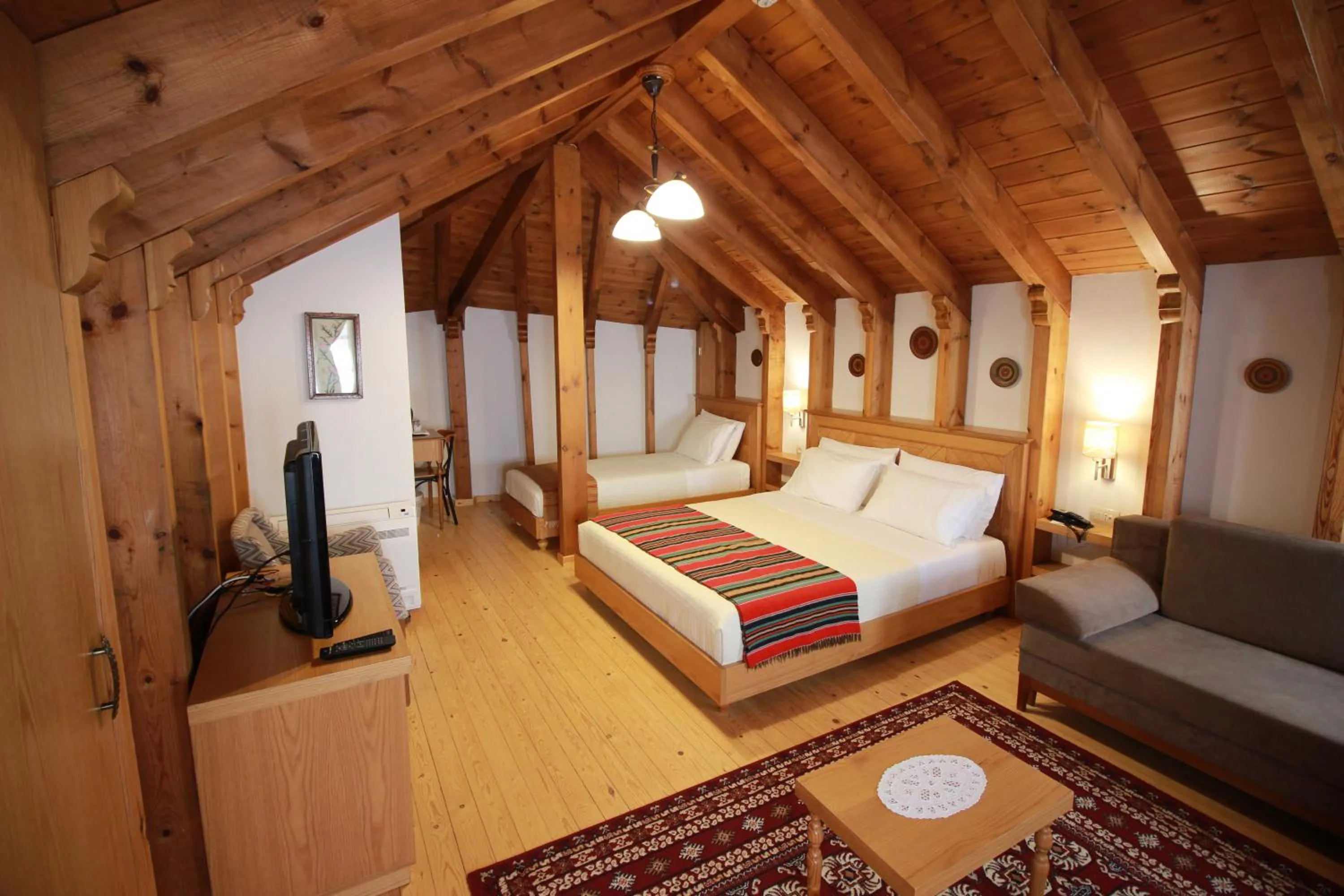 Bed in Hotel Argjiro