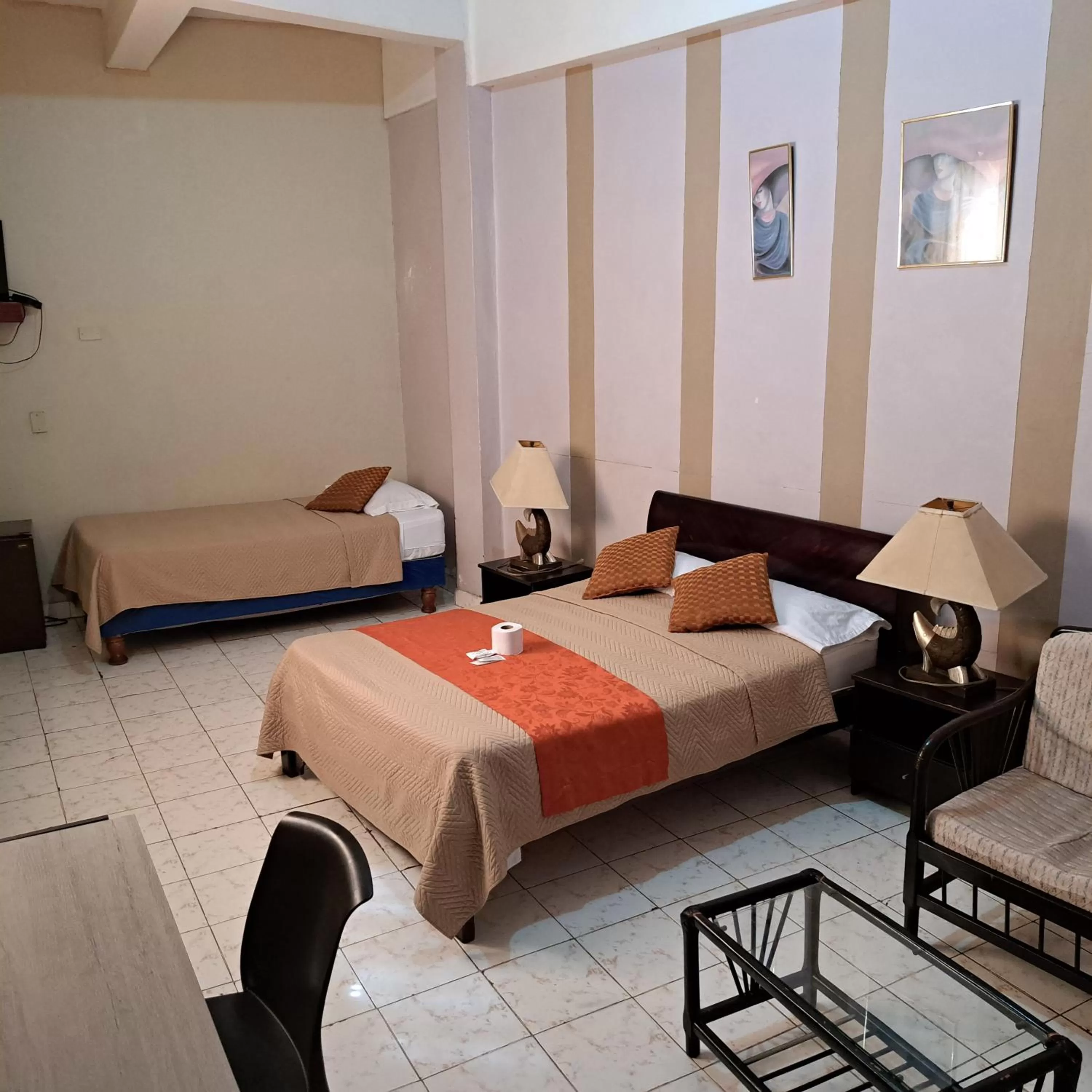 Photo of the whole room, Bed in Atlantic Suites Hotel