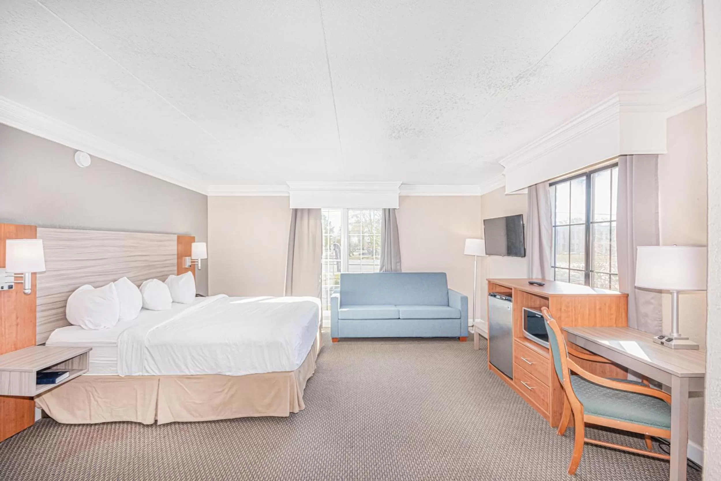 Bed in Casa Bella Inn & Suites Extended Stay