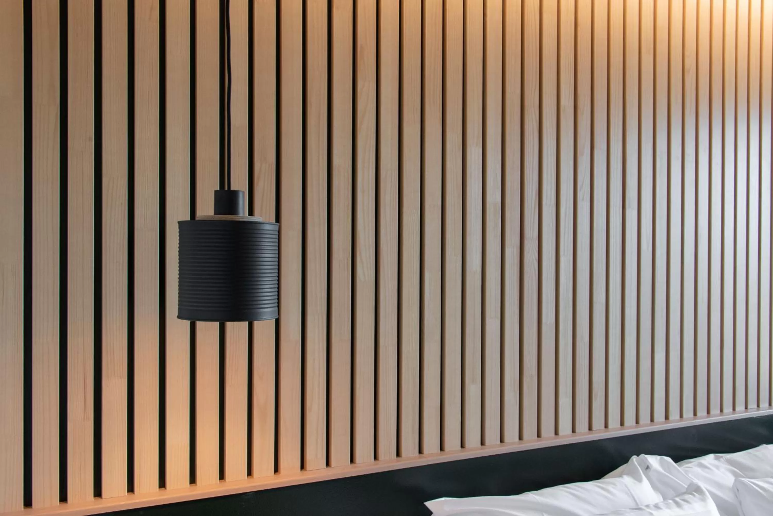 Bed in Haltia Lake Lodge nature boutique hotel & glamping