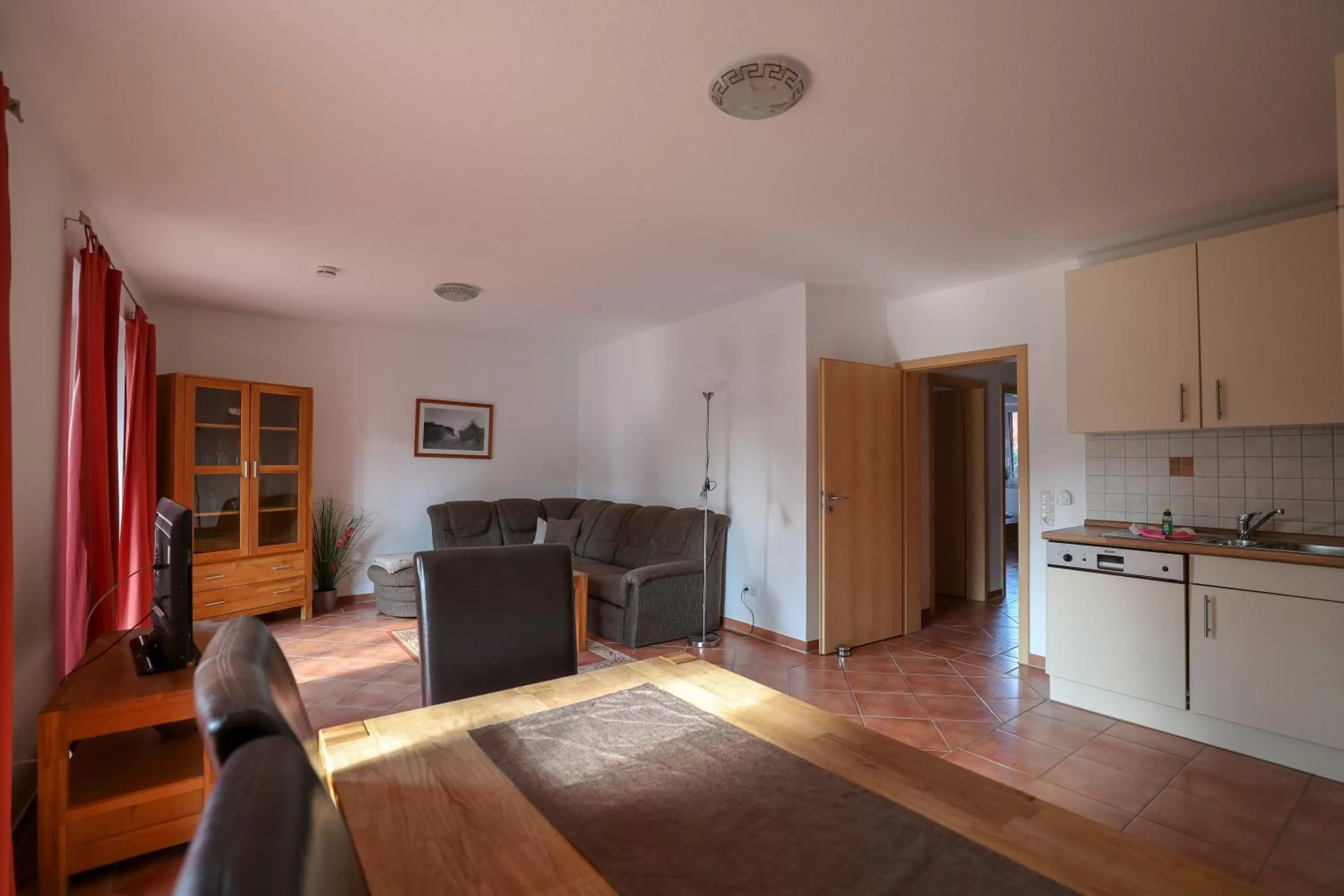 Living room, Kitchen/Kitchenette in Usedom Bike Hotel & Suites