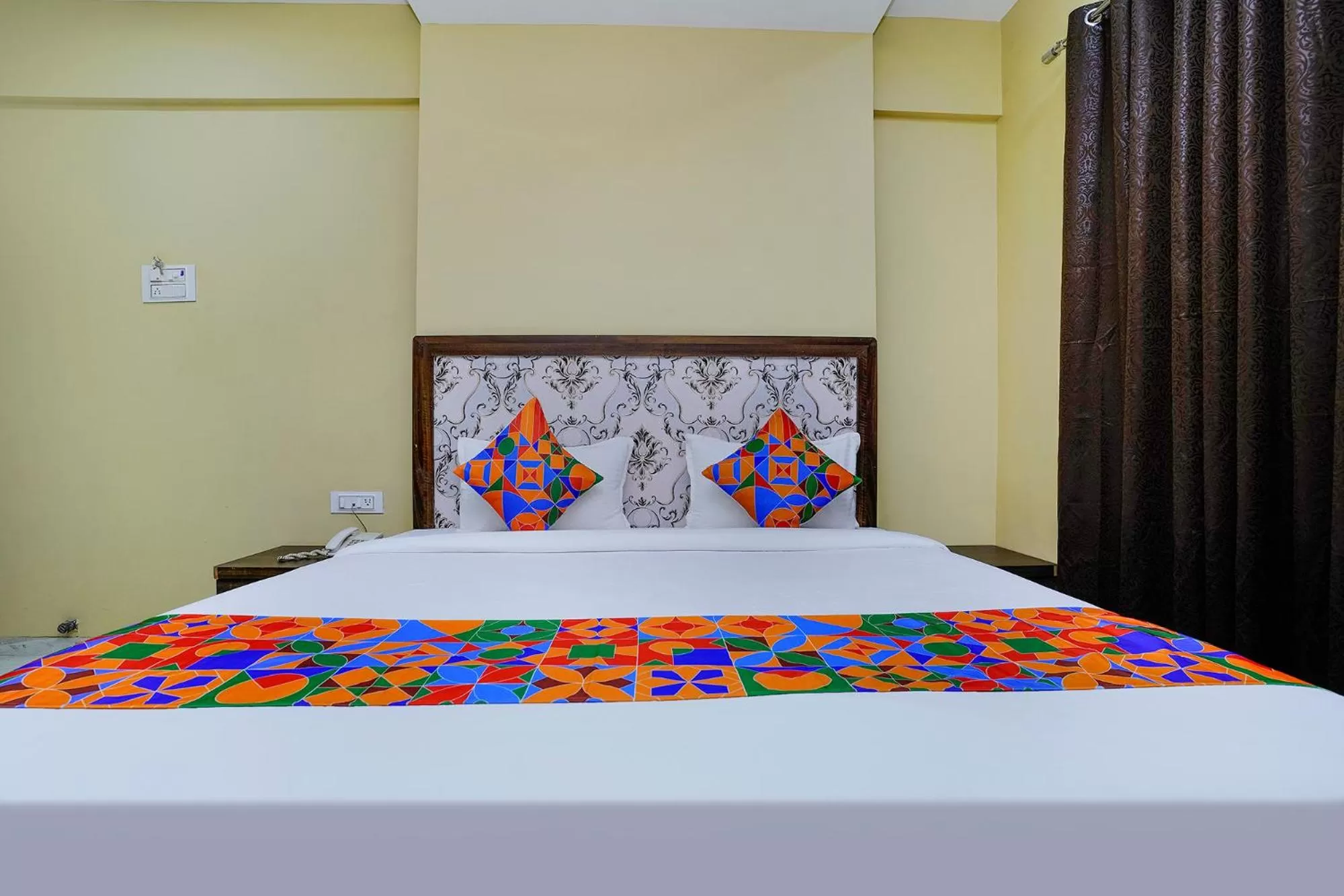 Bed in FabHotel Bhiwandi Palace