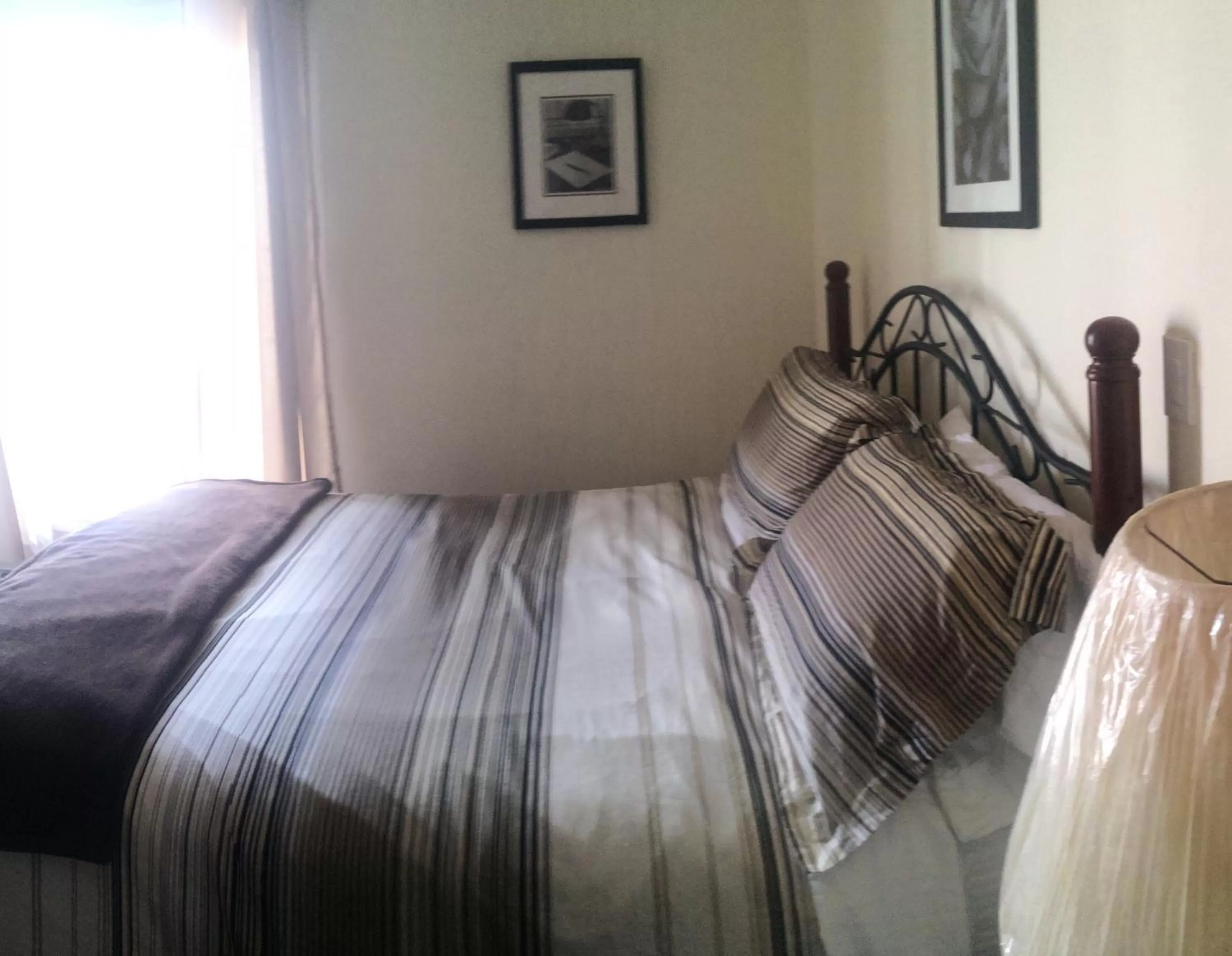 Bed in Dominion Hotel