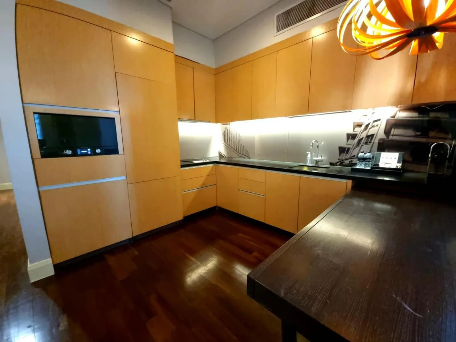 Kitchen or kitchenette in Ascott Raffles Place Singapore