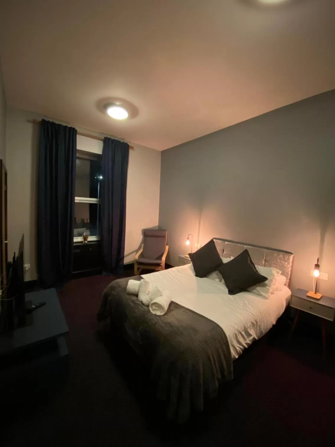 Bed in Bay view rooms at Mentone Hotel