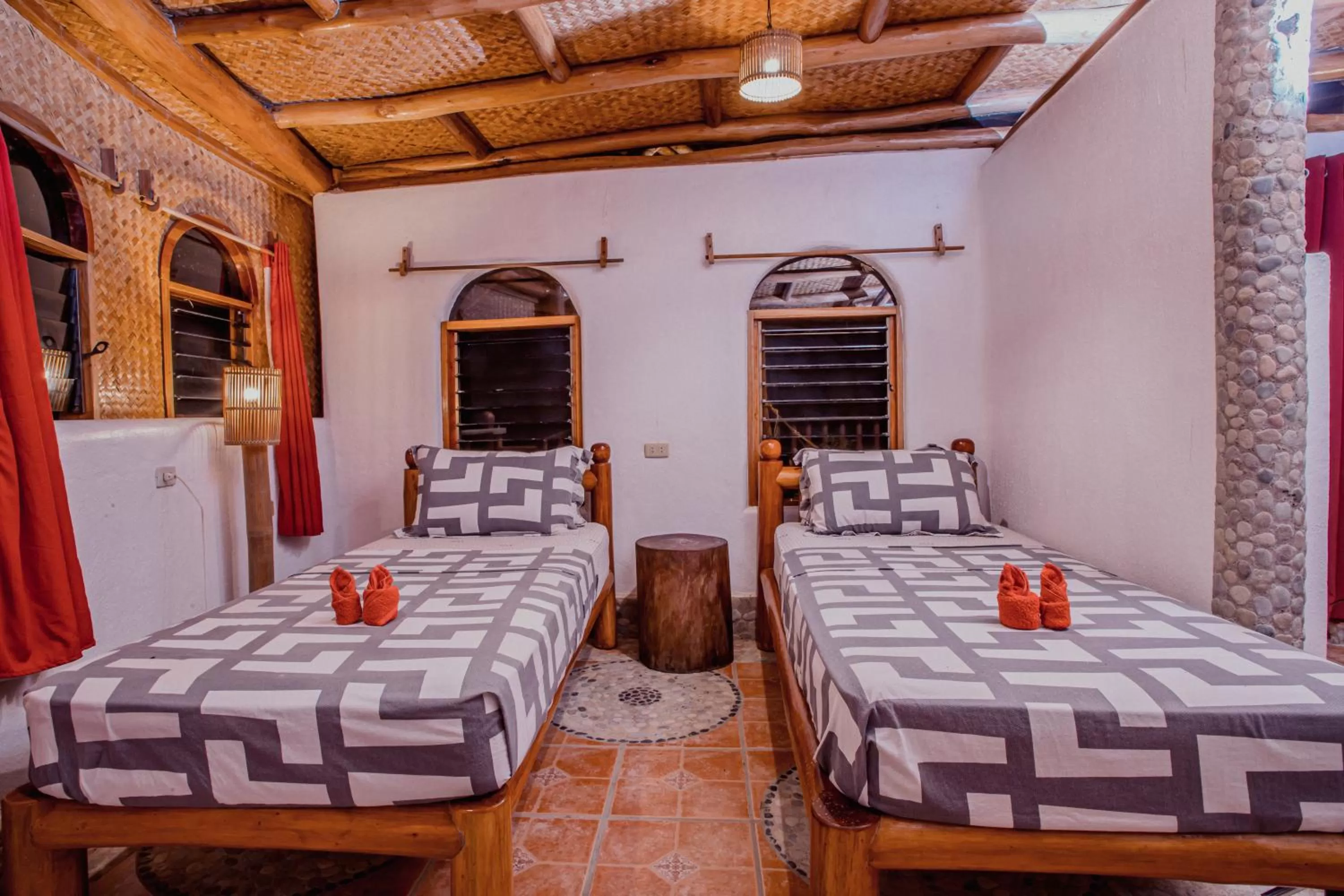 Bed in Atremaru Jungle Retreat