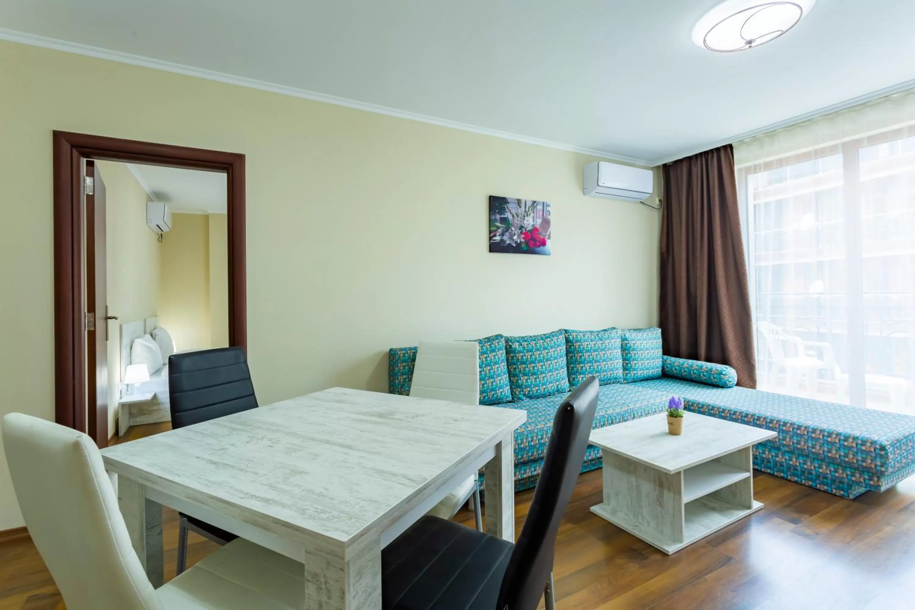 Living room, Dining Area in Rose Gardens Apart Hotel