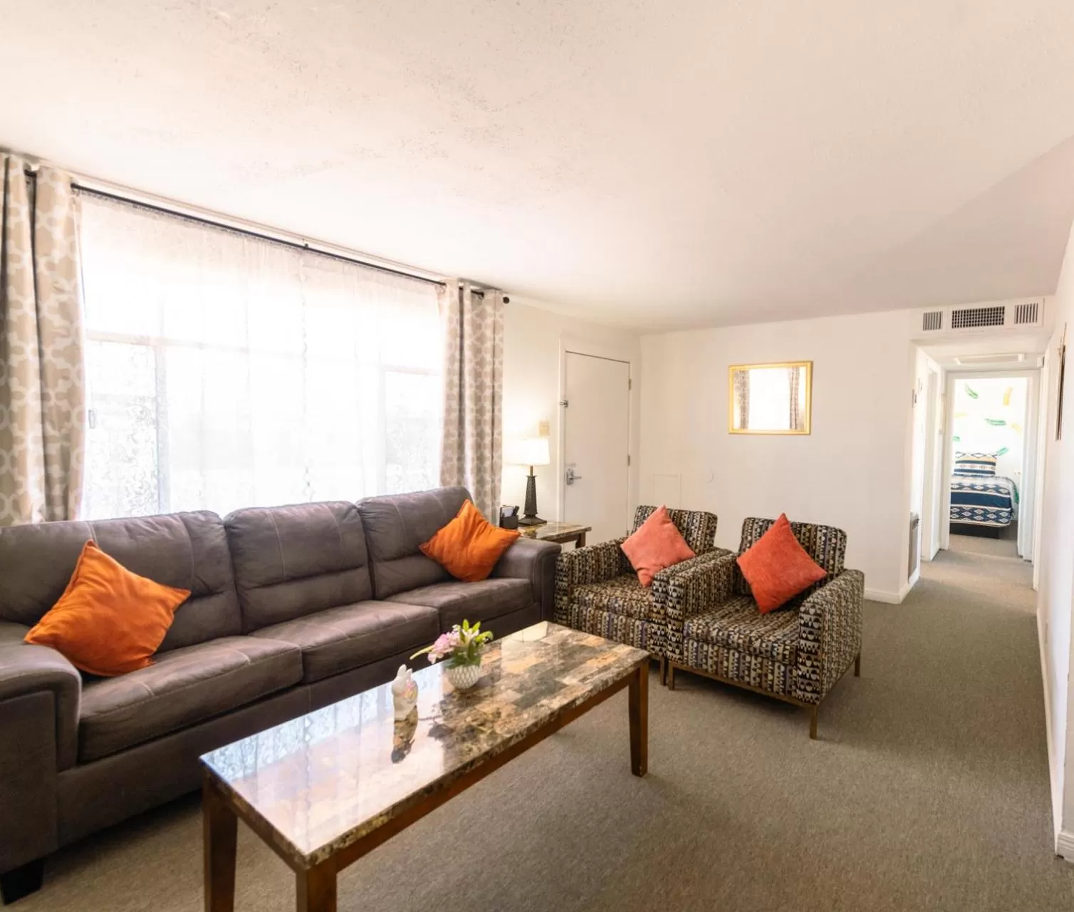 Living room in 1 or 3 Bedroom Apartment with Full Kitchen