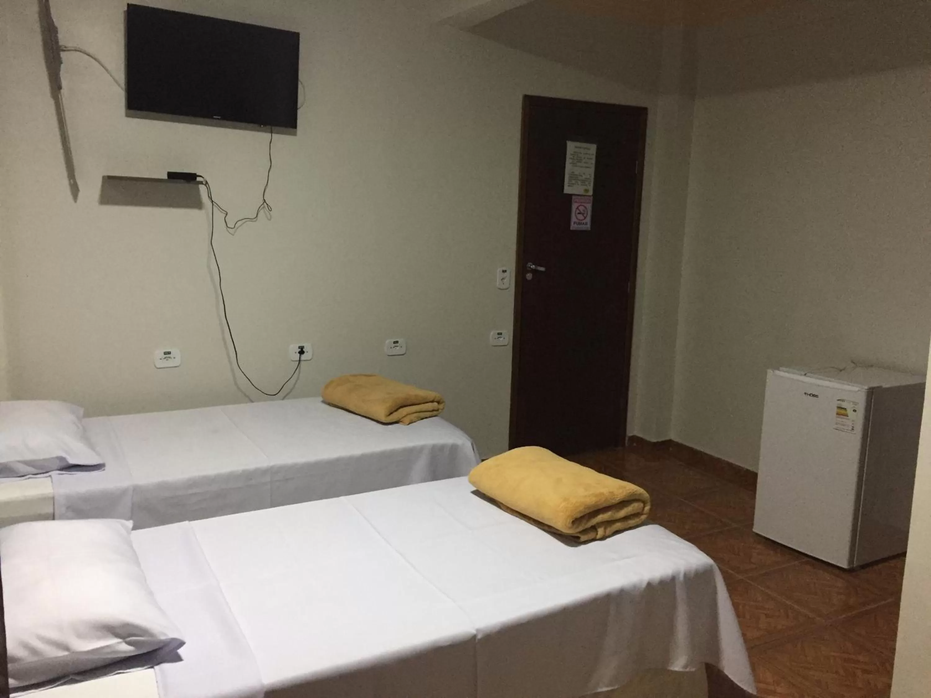 Bed in Hotel Paradizzo