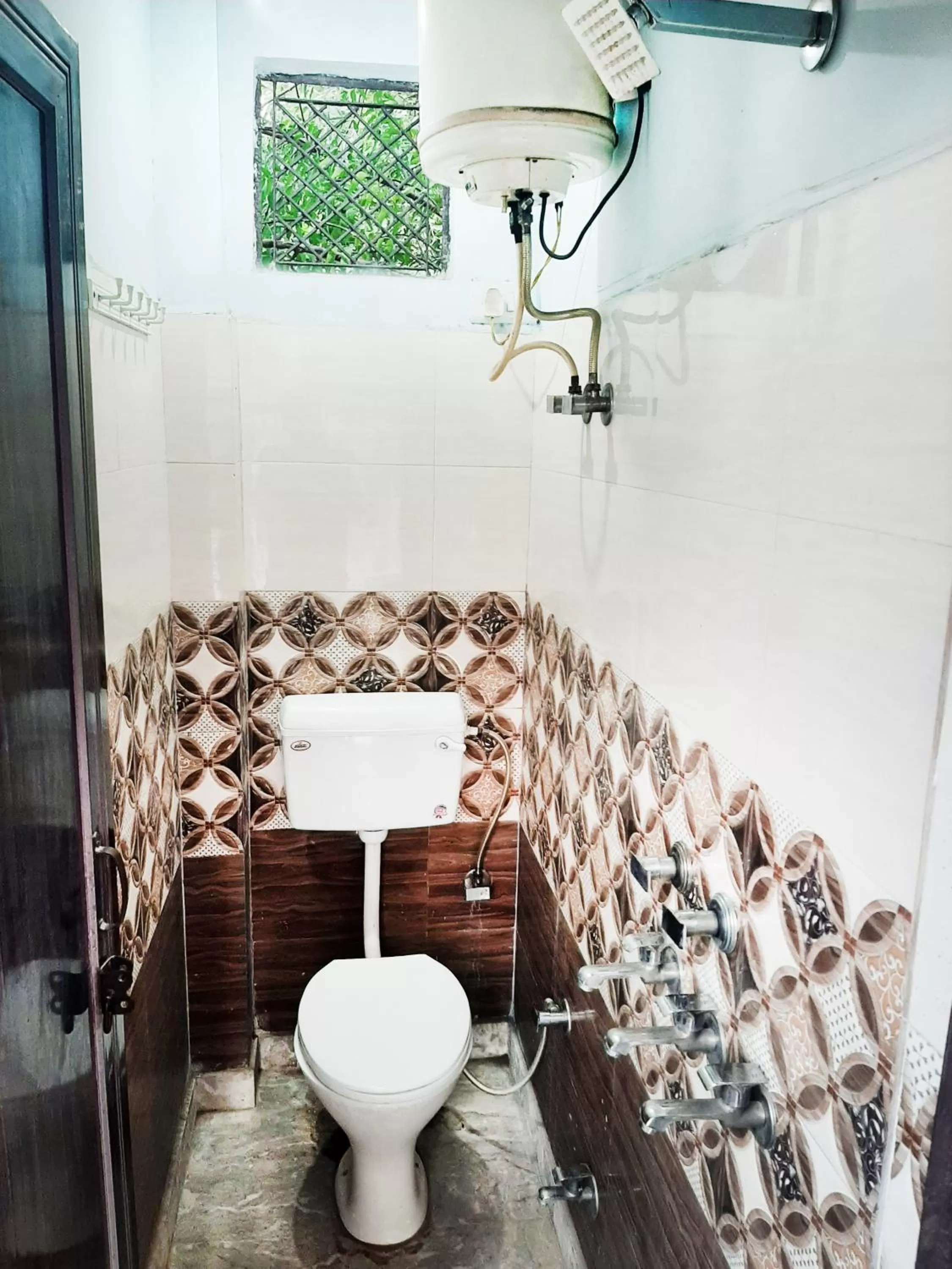 Toilet in AMAN RESIDENCY