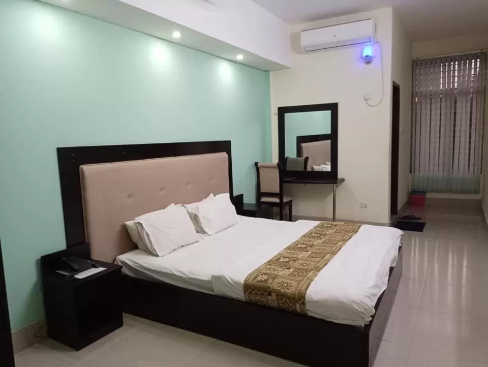 Bed in Grand Surma Hotel