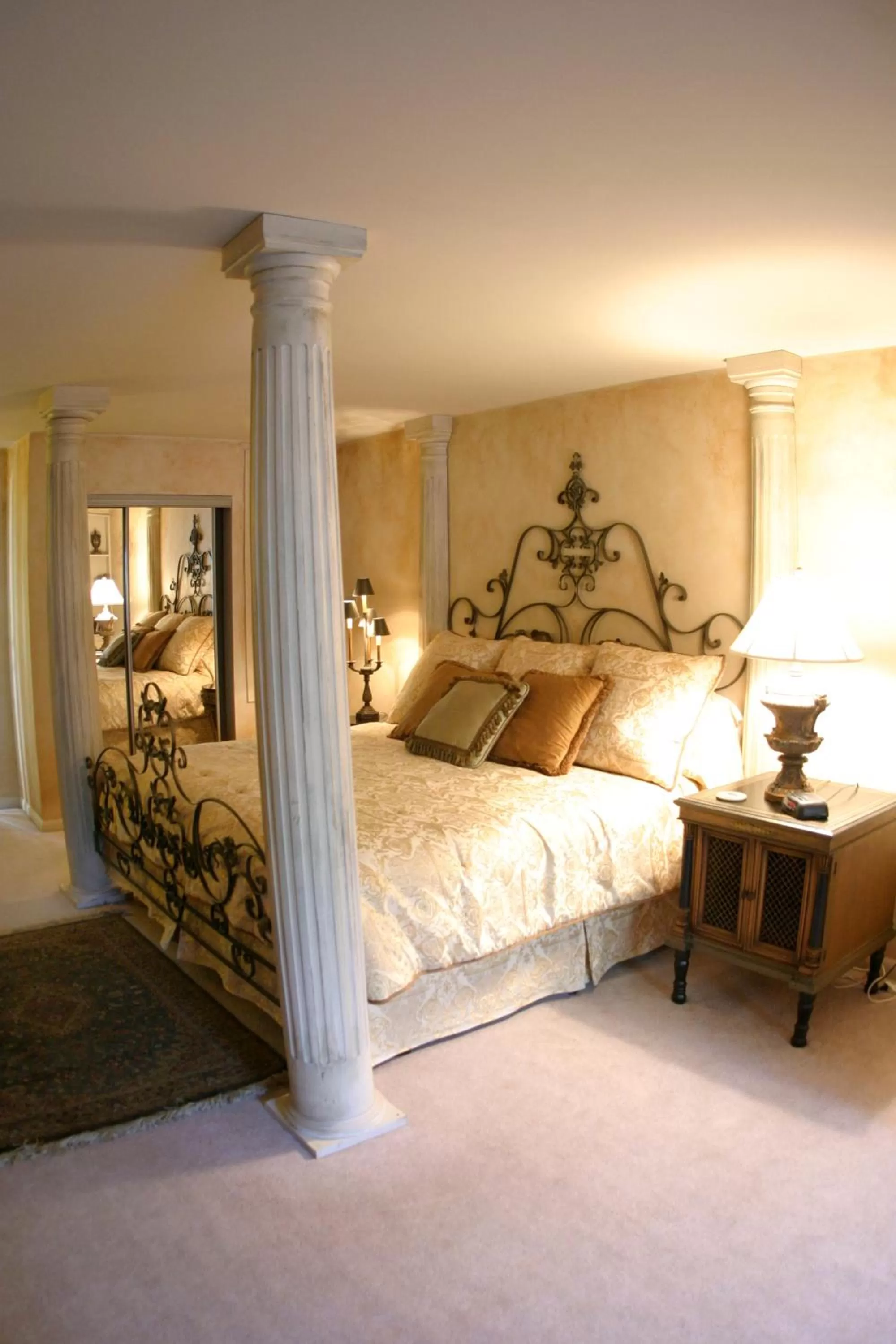 Bed in Historic Michabelle Inn