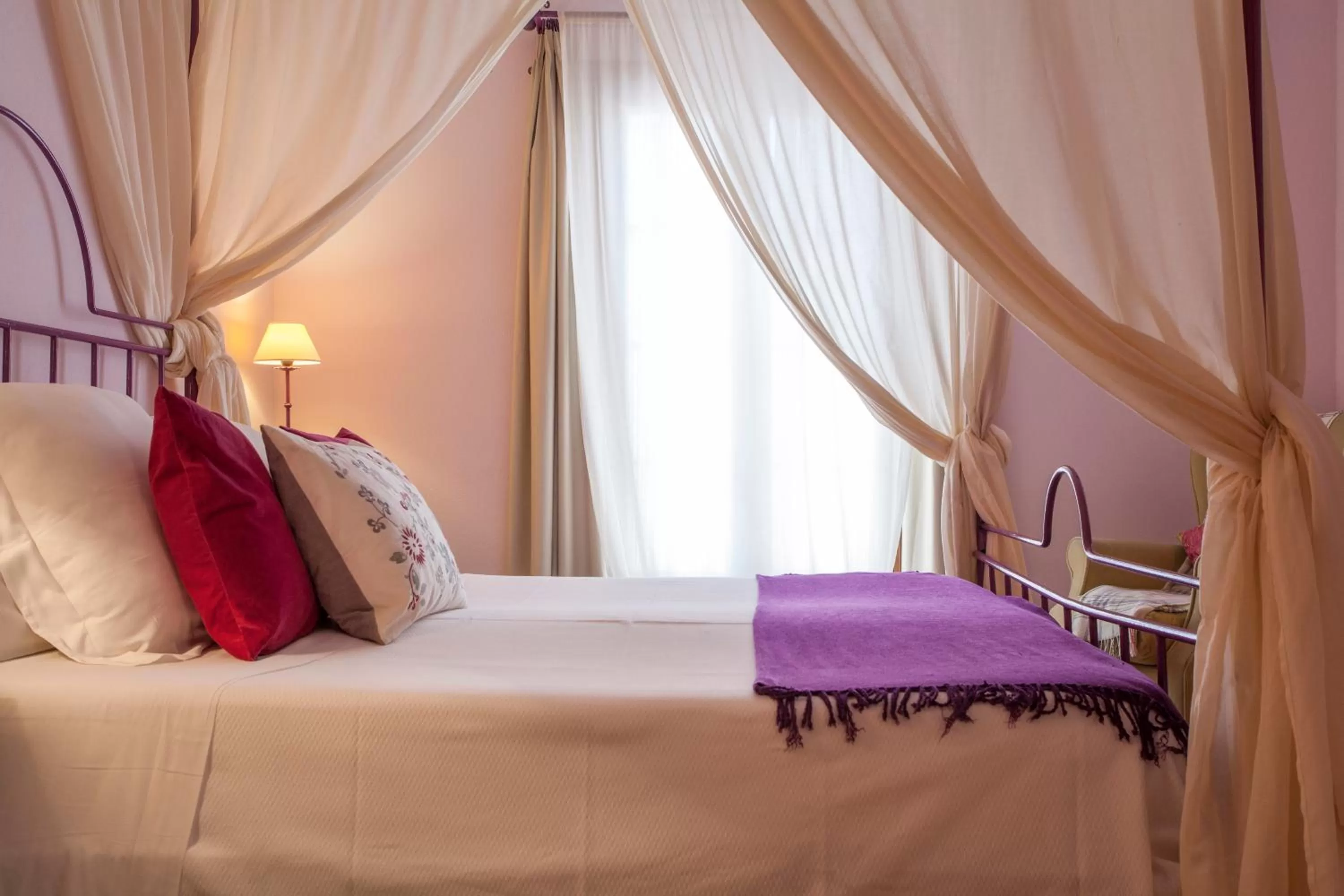 Bed in La Casa del Maestro Boutique