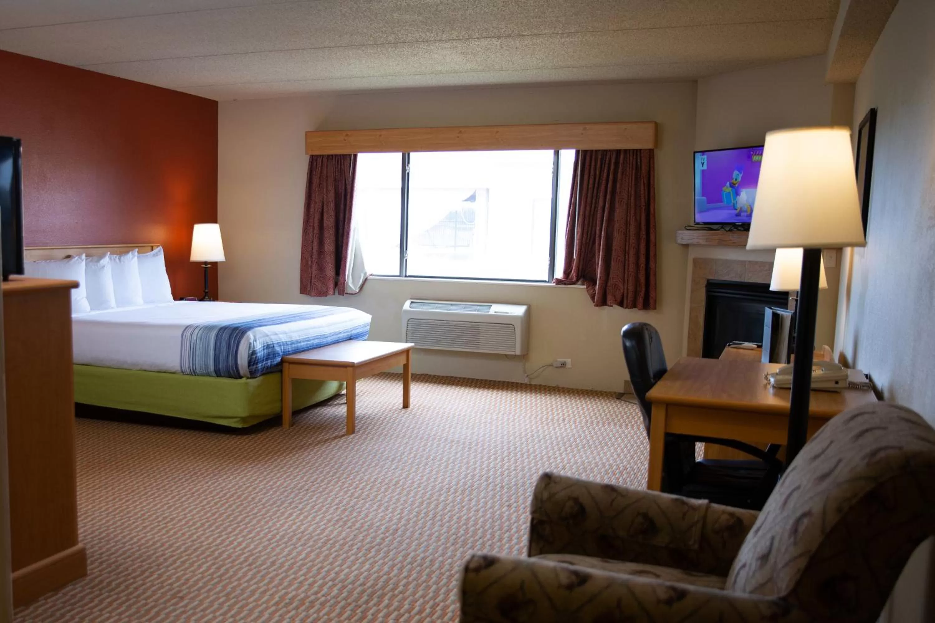 Bedroom, Bed in AmericInn by Wyndham Pampa Event Center