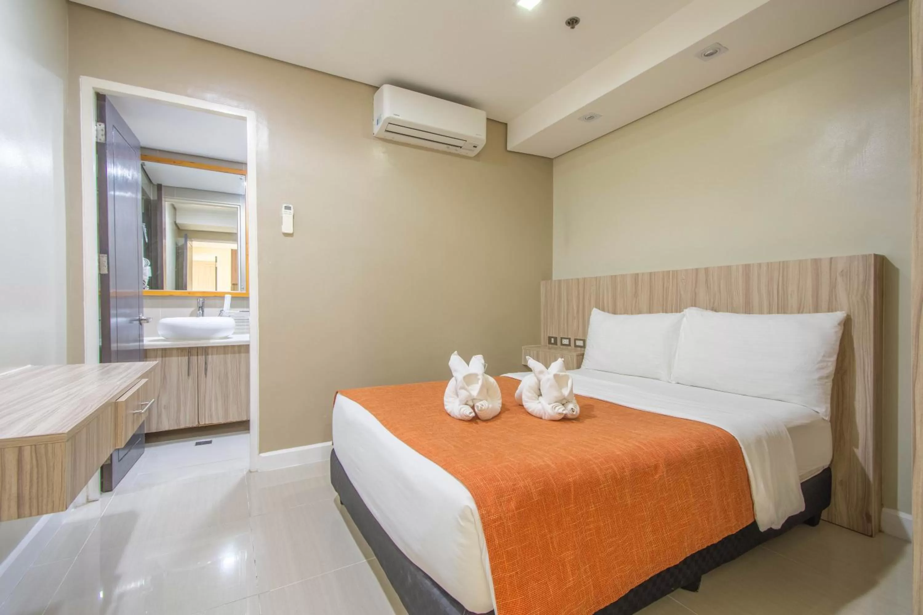 Bed in Alicia Apartelle