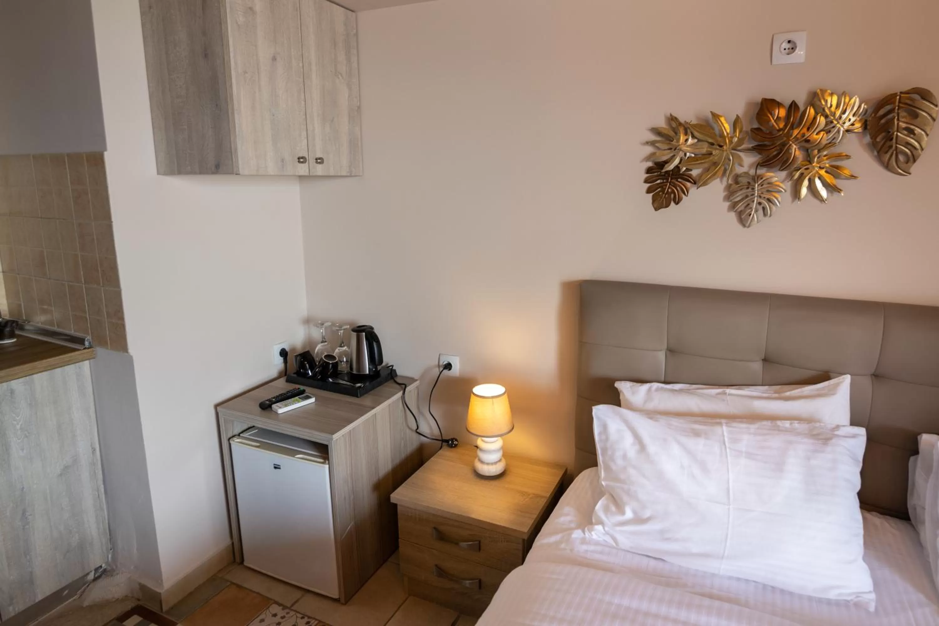 Bed in Votsalakia Hotel & Luxury Apartments