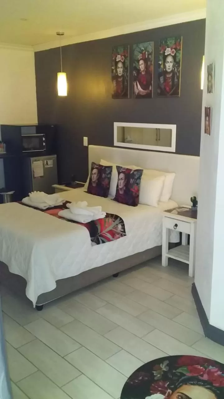 Bed in Vignes Guest Lodge