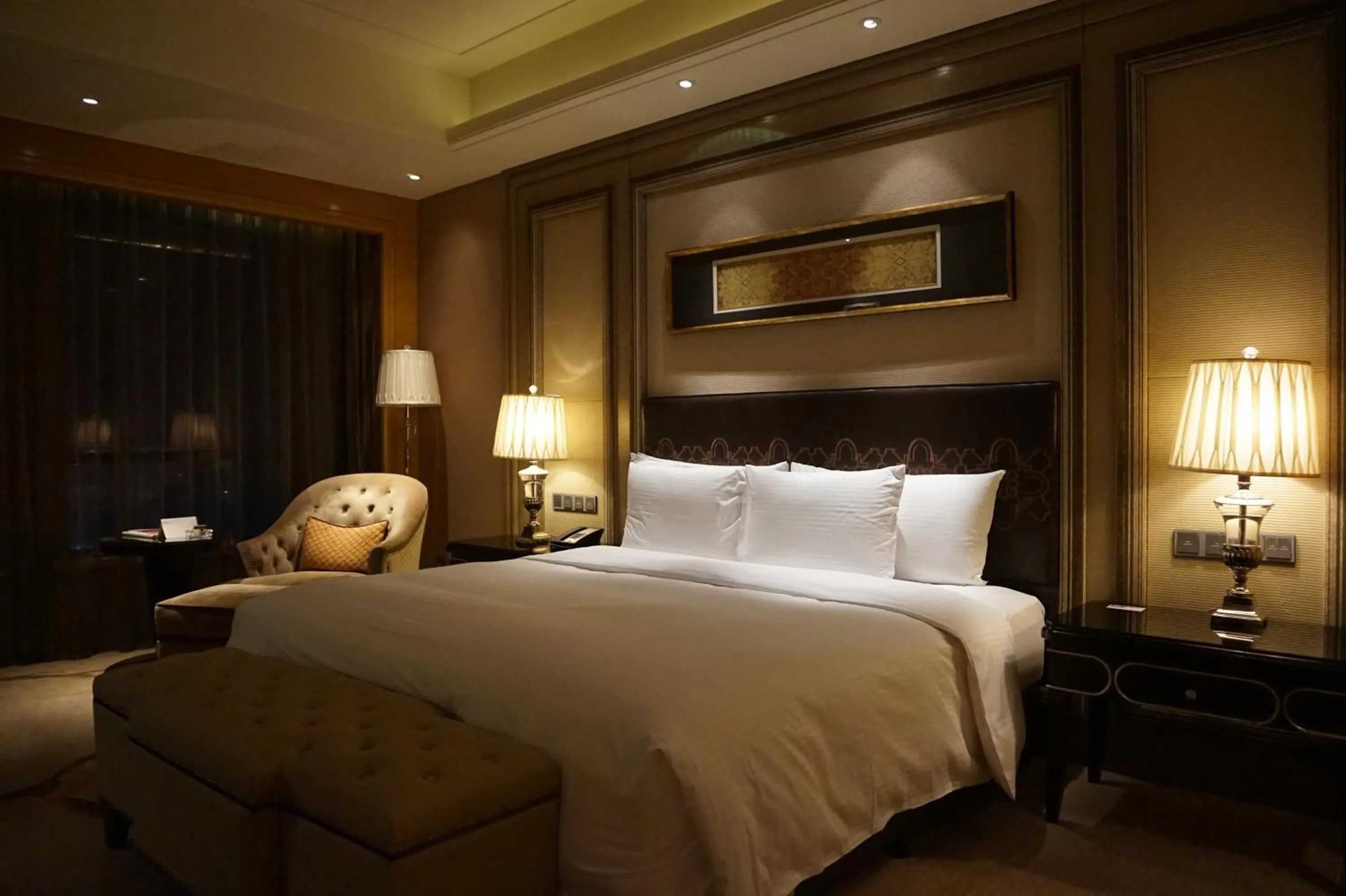 Bed in Wanda Realm Harbin Hotel