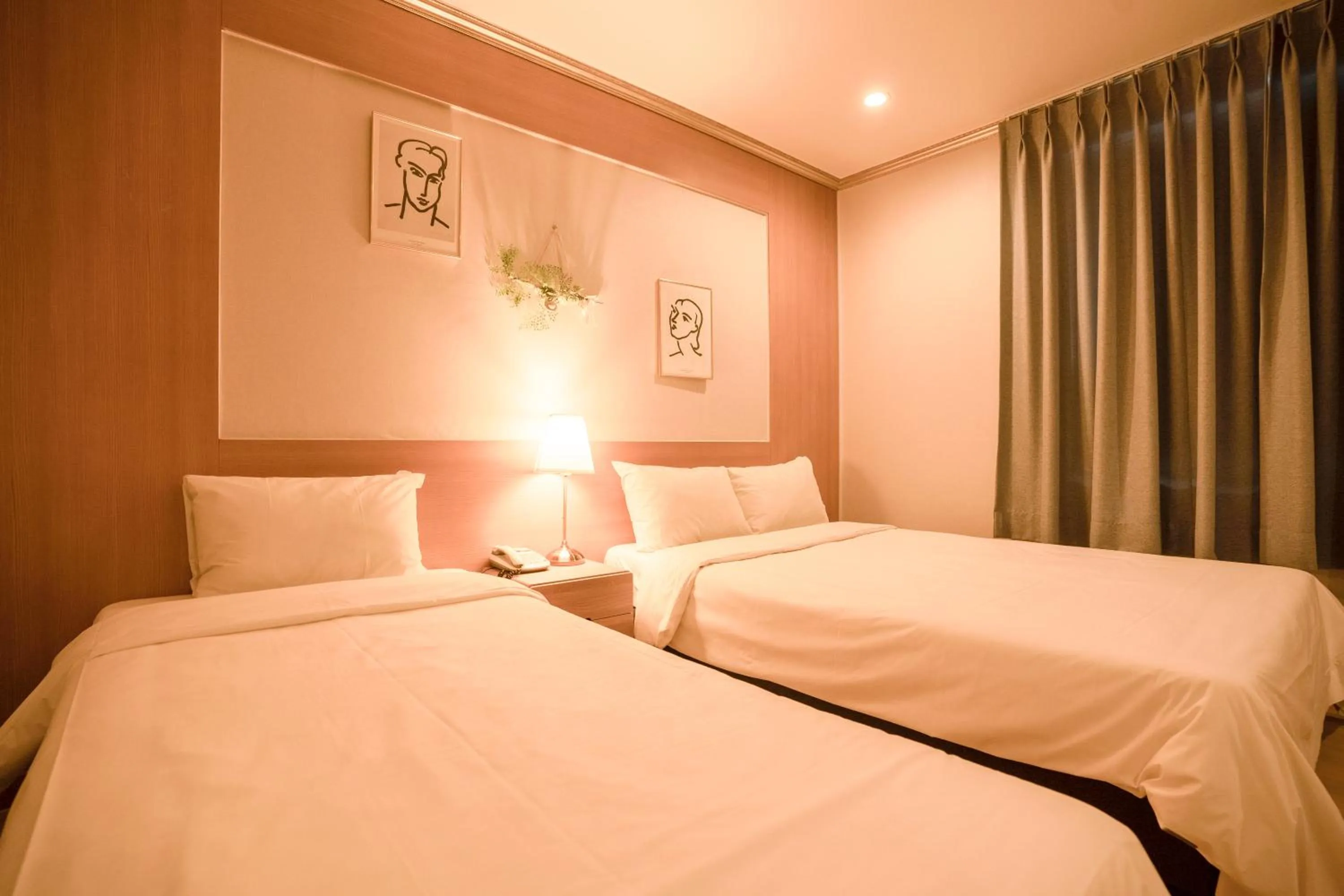 Bed in Jeju Stay Hotel