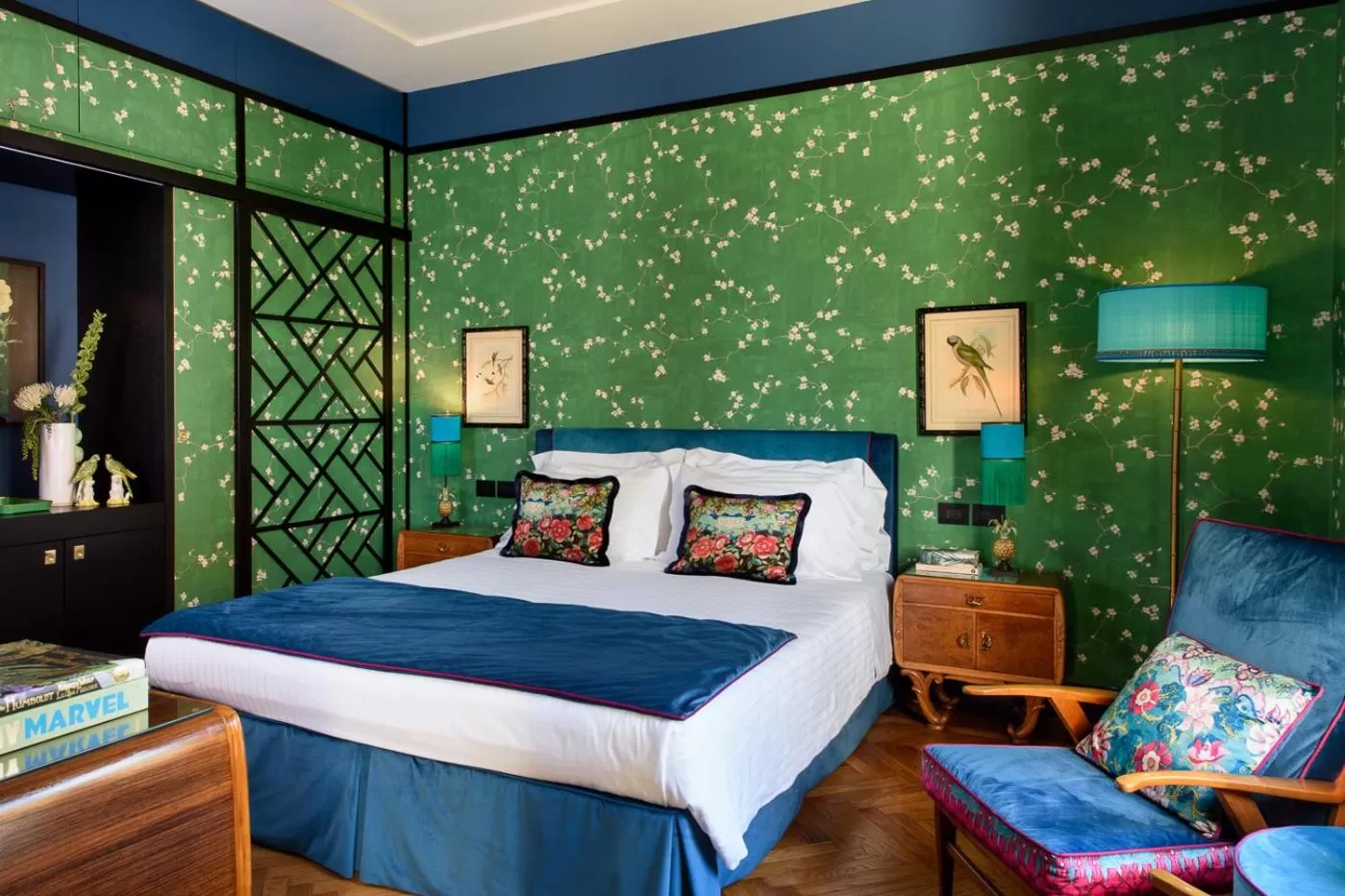 Bed in Velona's Jungle Luxury Suites