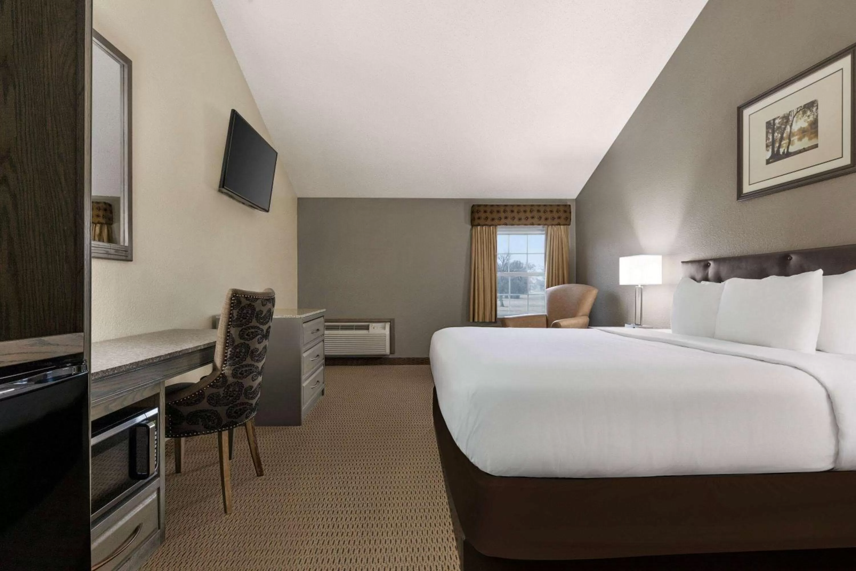 Photo of the whole room, Bed in Travelodge by Wyndham Coffeyville