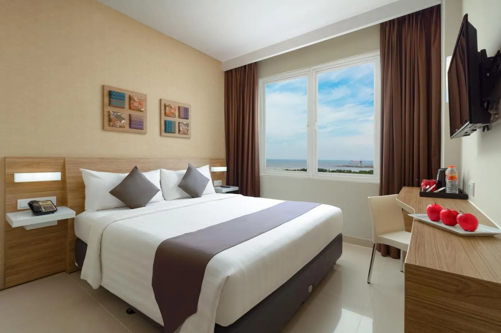 Bedroom, Bed in Hotel NEO Cirebon by ASTON