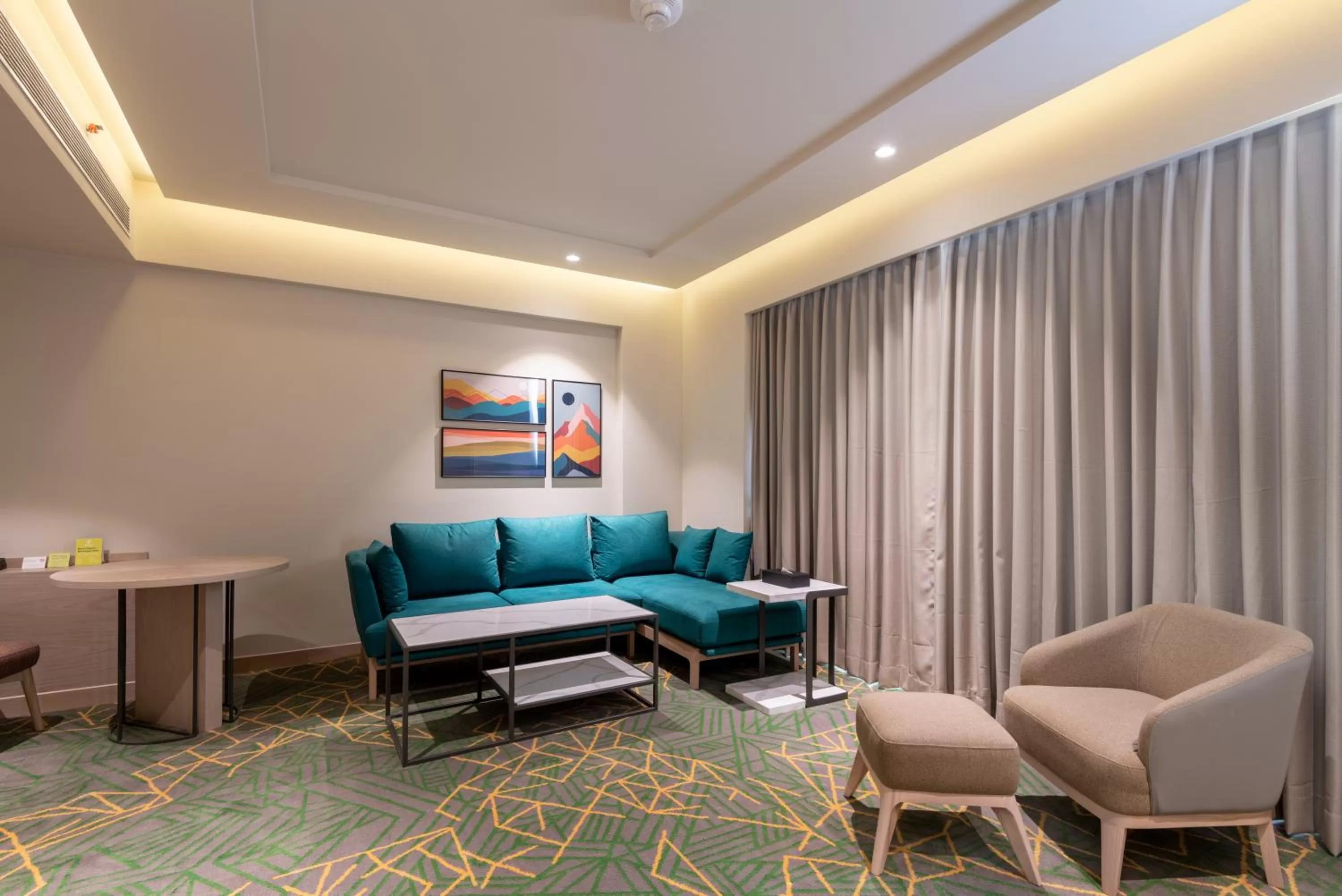 Living room in Holiday Inn Katra Vaishno Devi by IHG