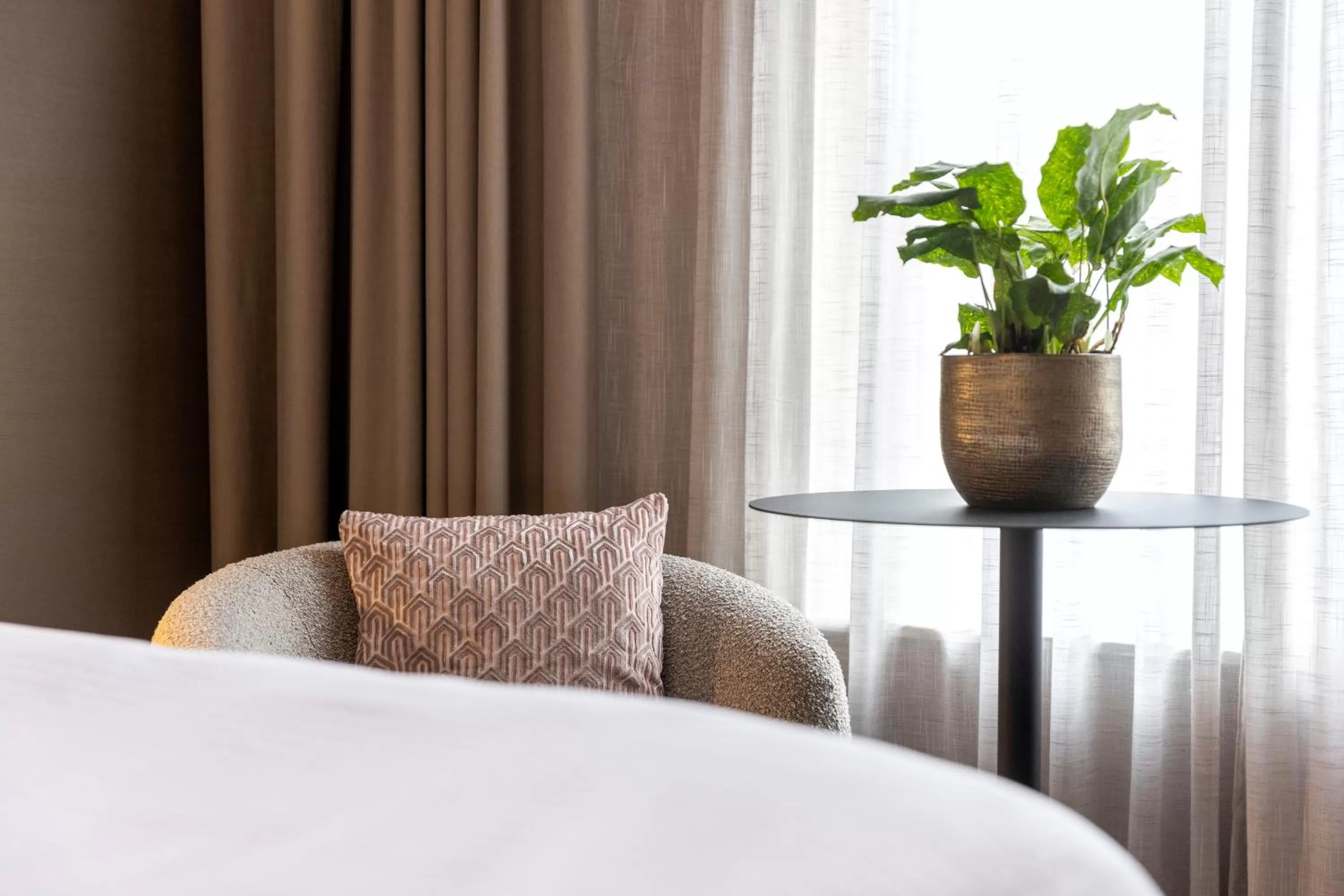 Seating area, Bed in Breathe Boutique Hotel