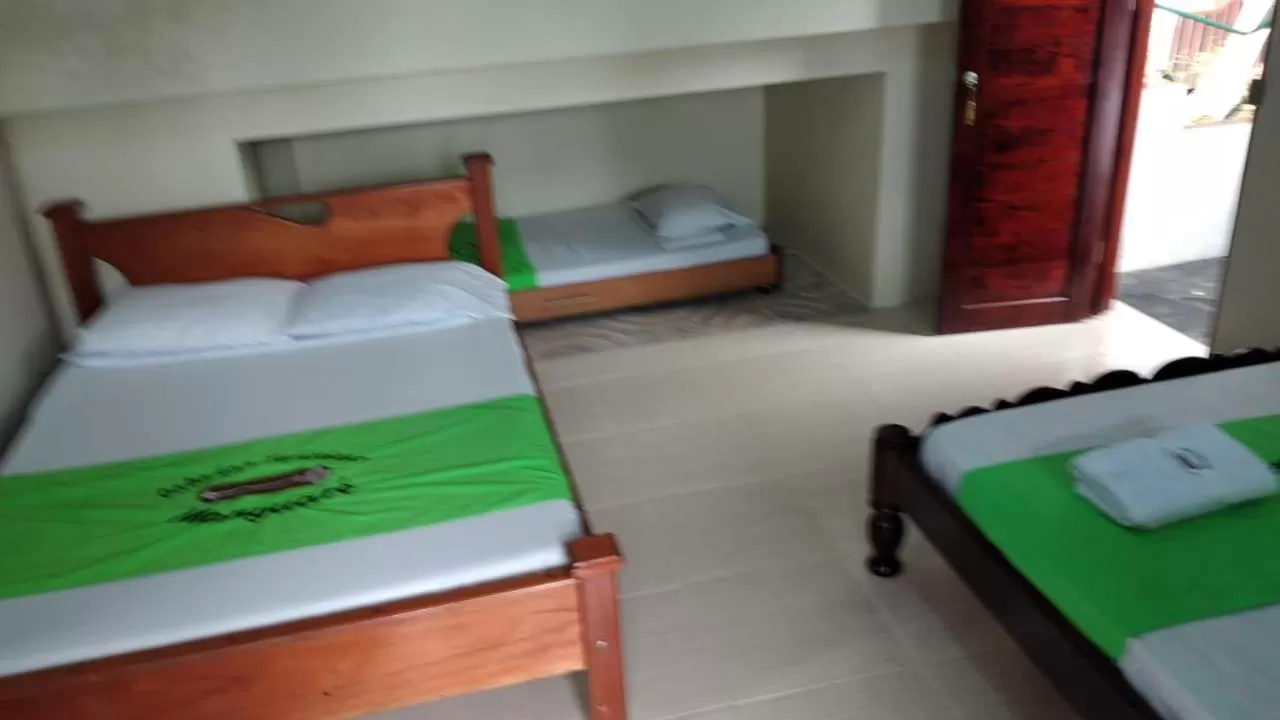 Photo of the whole room, Bed in Ecocabañas Manguare